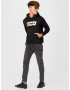 LEVI'S Mikina 'LSE_T3 GRAPHIC HOODIE BLACKS' zlatá / čierna - Pepit.sk