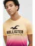 Hollister Co. Bavlnené tričko žltá farba vzorované - Pepit.sk