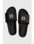 Tommy Hilfiger Kožené šľapky TH RUBBER PATCH LEATHER SANDAL pánske čierna farba FM0FM05031 - Pepit.sk