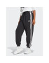 adidas Teplákové nohavice Essentials 3-Stripes French Terry Loose-Fit Joggers HA4375 Čierna Loose Fit - Pepit.sk