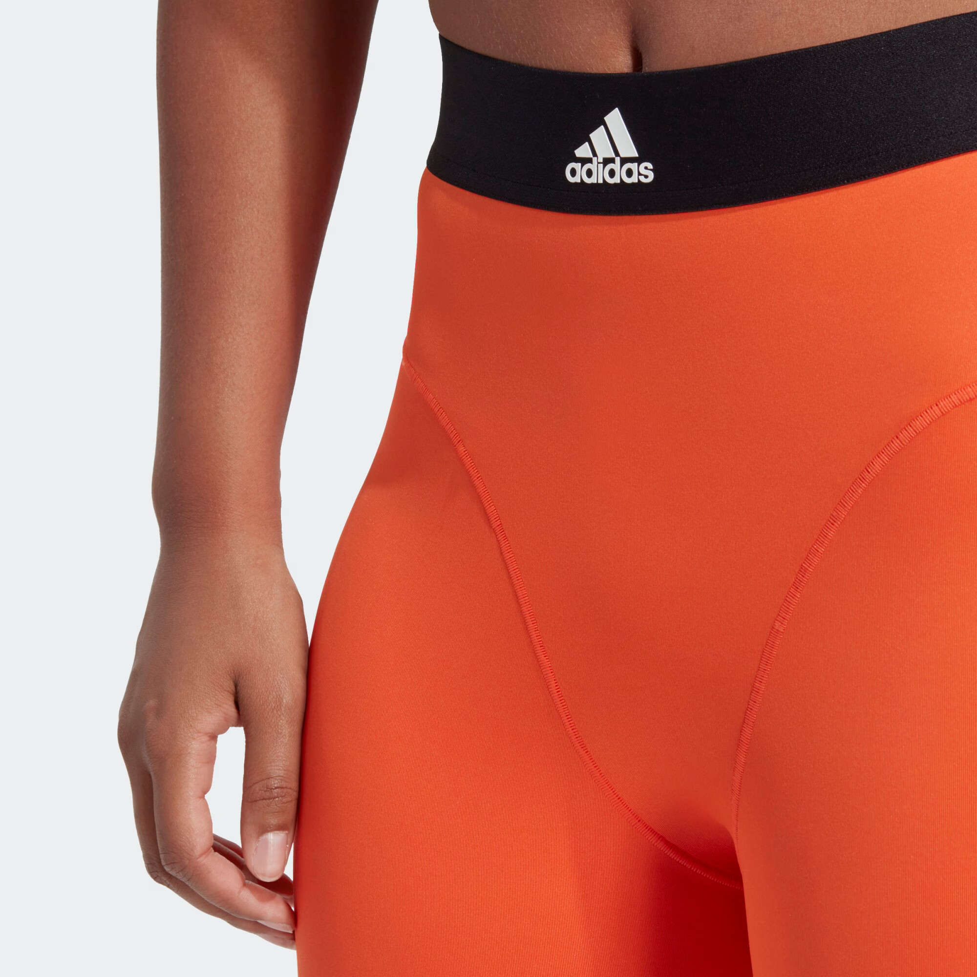 ADIDAS SPORTSWEAR Športové nohavice oranžová / čierna / biela - Pepit.sk