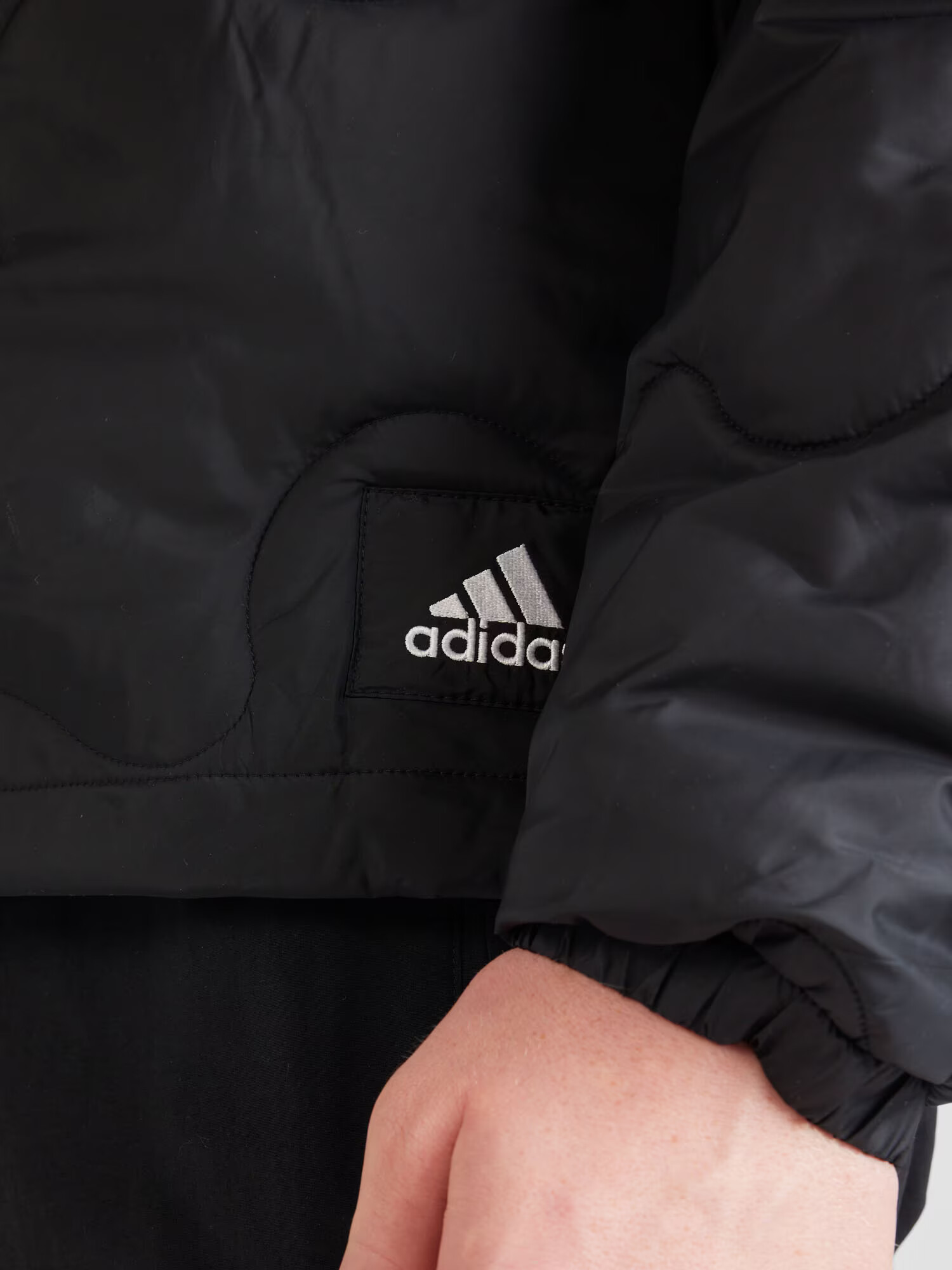 ADIDAS SPORTSWEAR Športová bunda 'Nuganic' čierna / biela - Pepit.sk