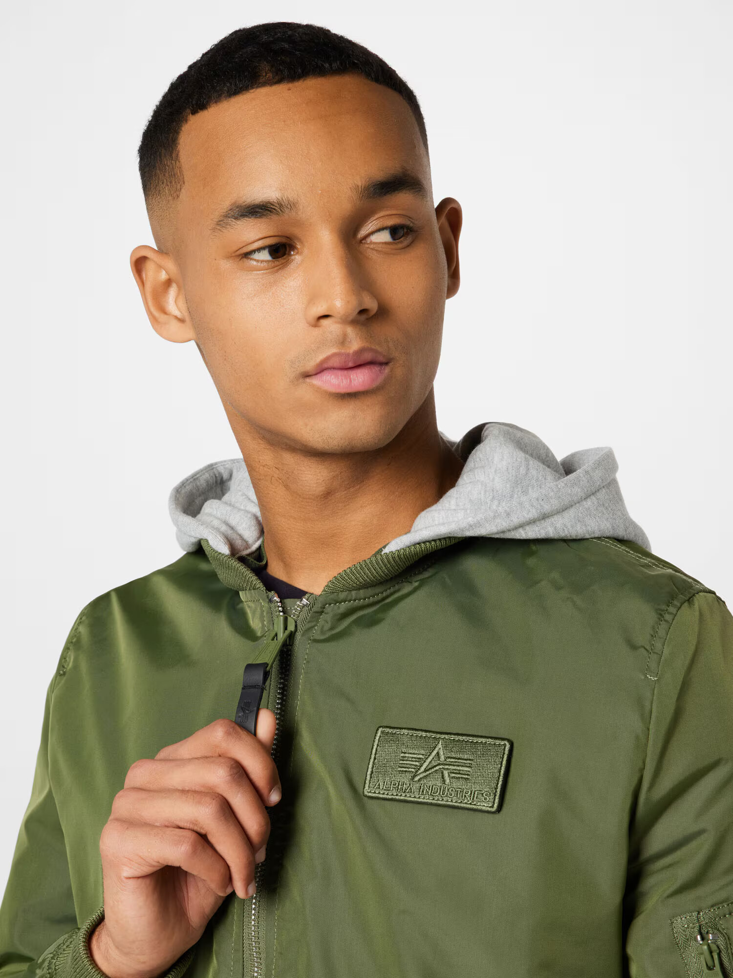 ALPHA INDUSTRIES Prechodná bunda sivá melírovaná / olivová / červená / biela - Pepit.sk