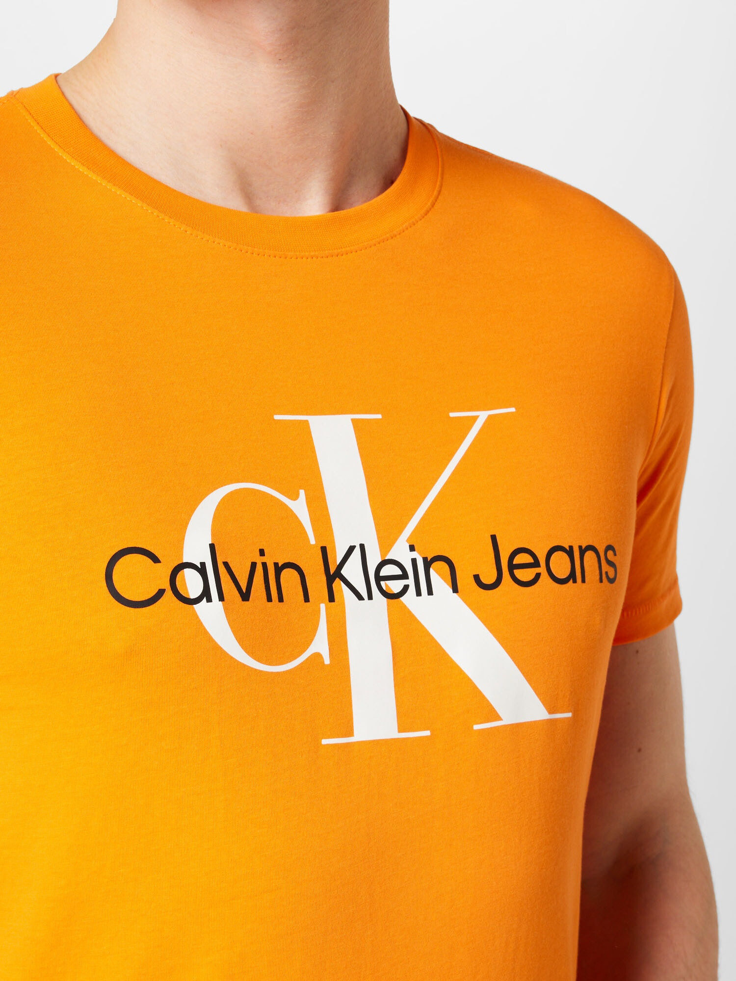 Calvin Klein Jeans Tričko oranžová / čierna / biela - Pepit.sk