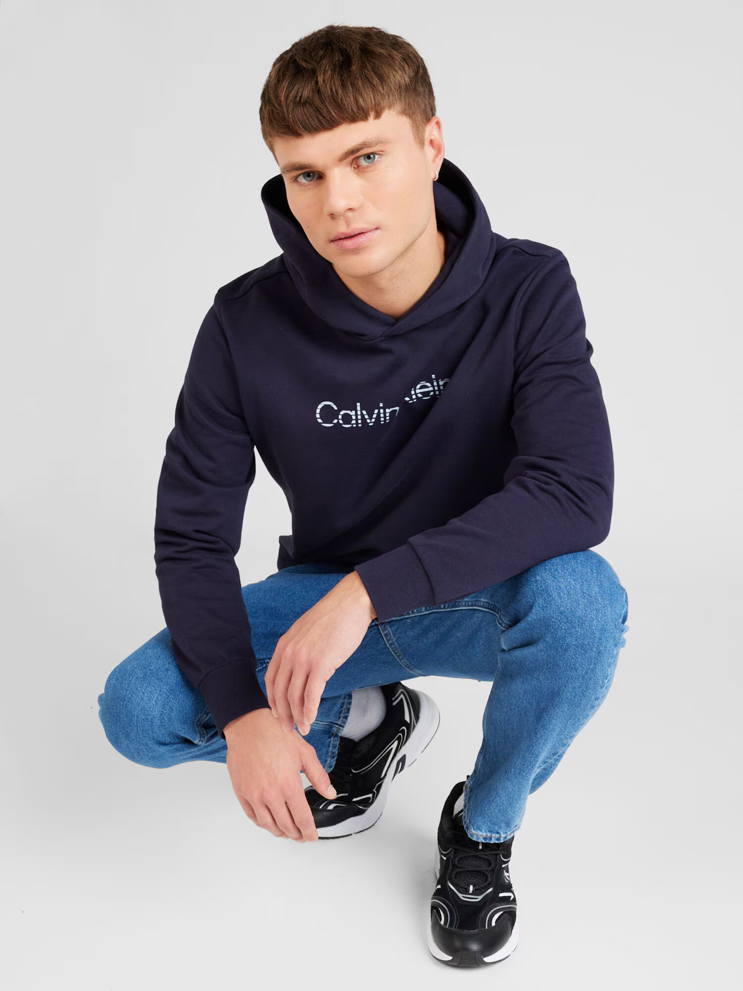 Calvin Klein Mikina tmavomodrá / biela - Pepit.sk