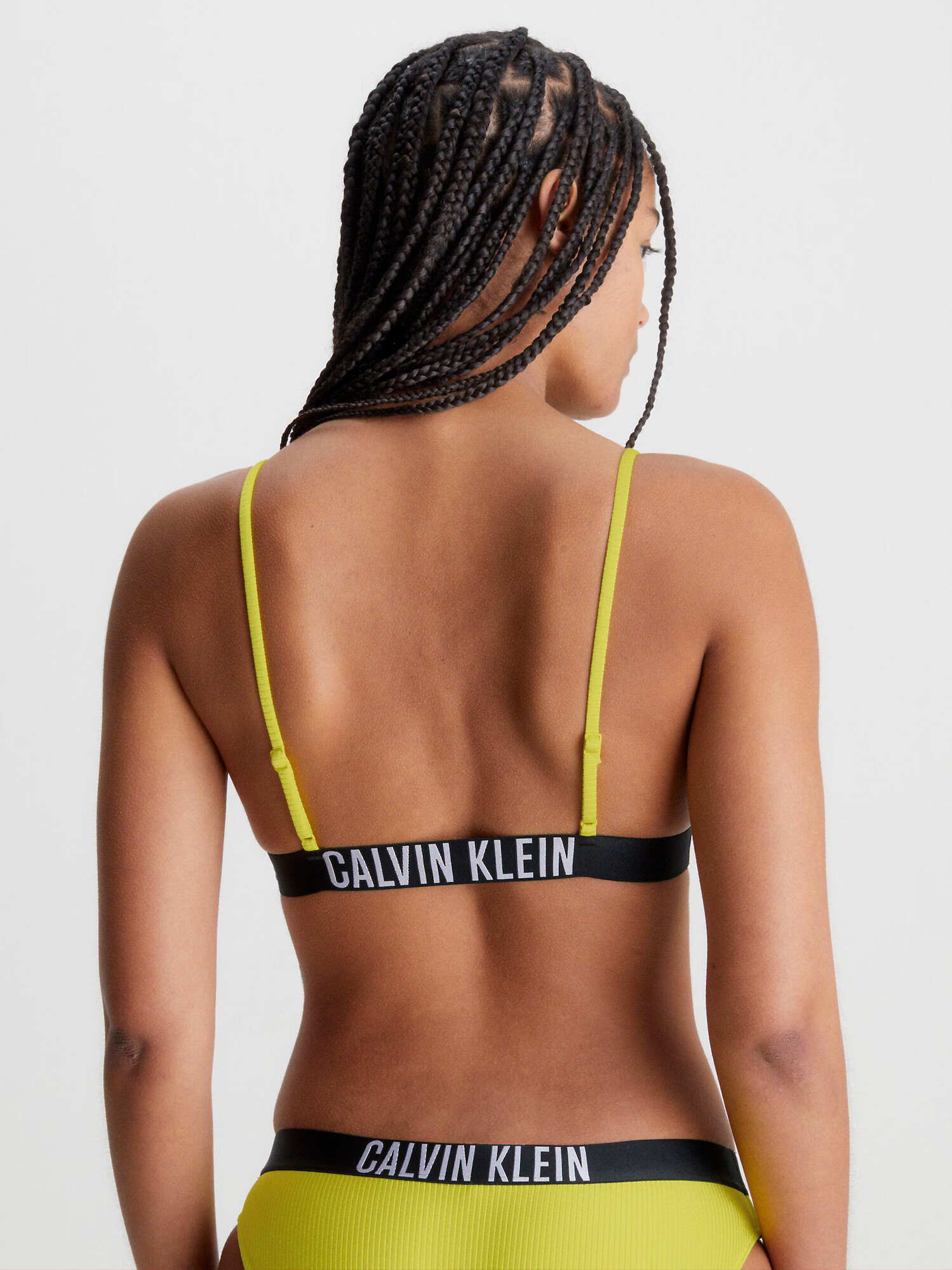 Calvin Klein Swimwear Bikinový top žltá - Pepit.sk