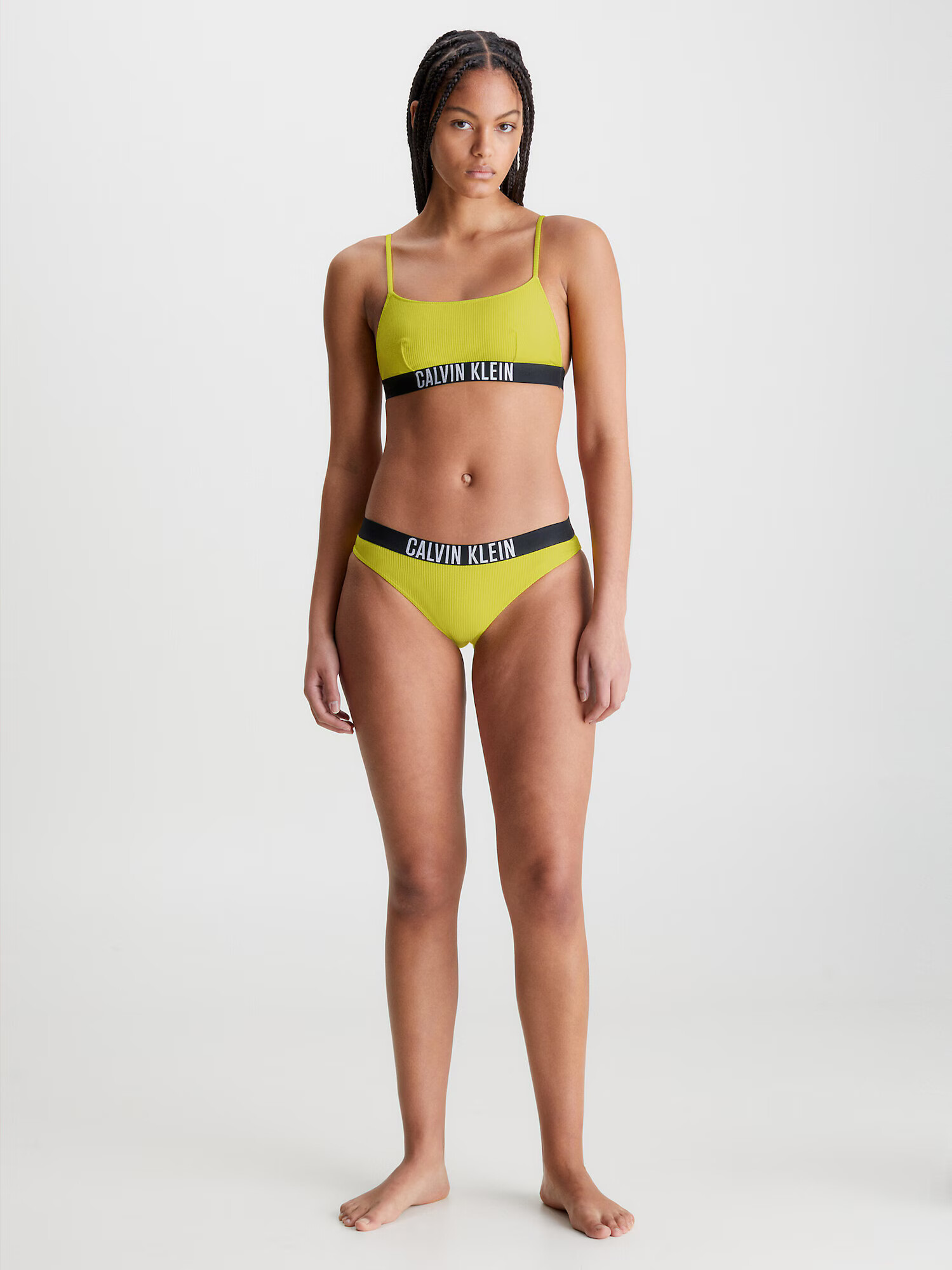 Calvin Klein Swimwear Bikinový top žltá - Pepit.sk