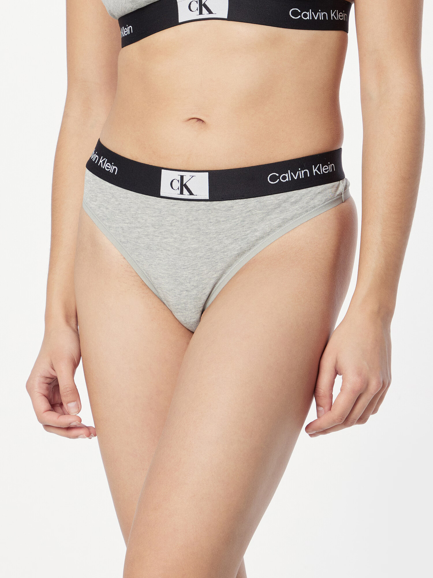 Calvin Klein Underwear Tangá svetlosivá / čierna / biela - Pepit.sk