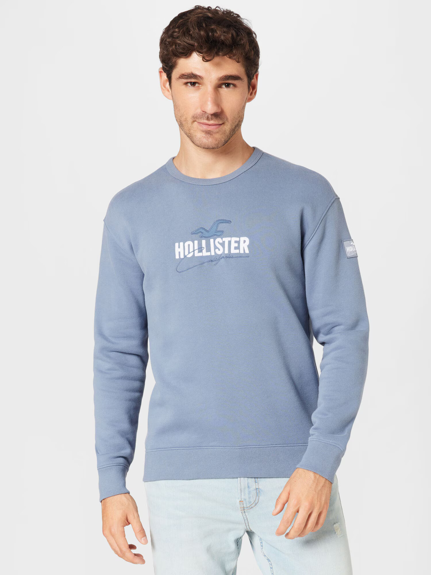 HOLLISTER Mikina 'EMEA' dymovo modrá / biela - Pepit.sk