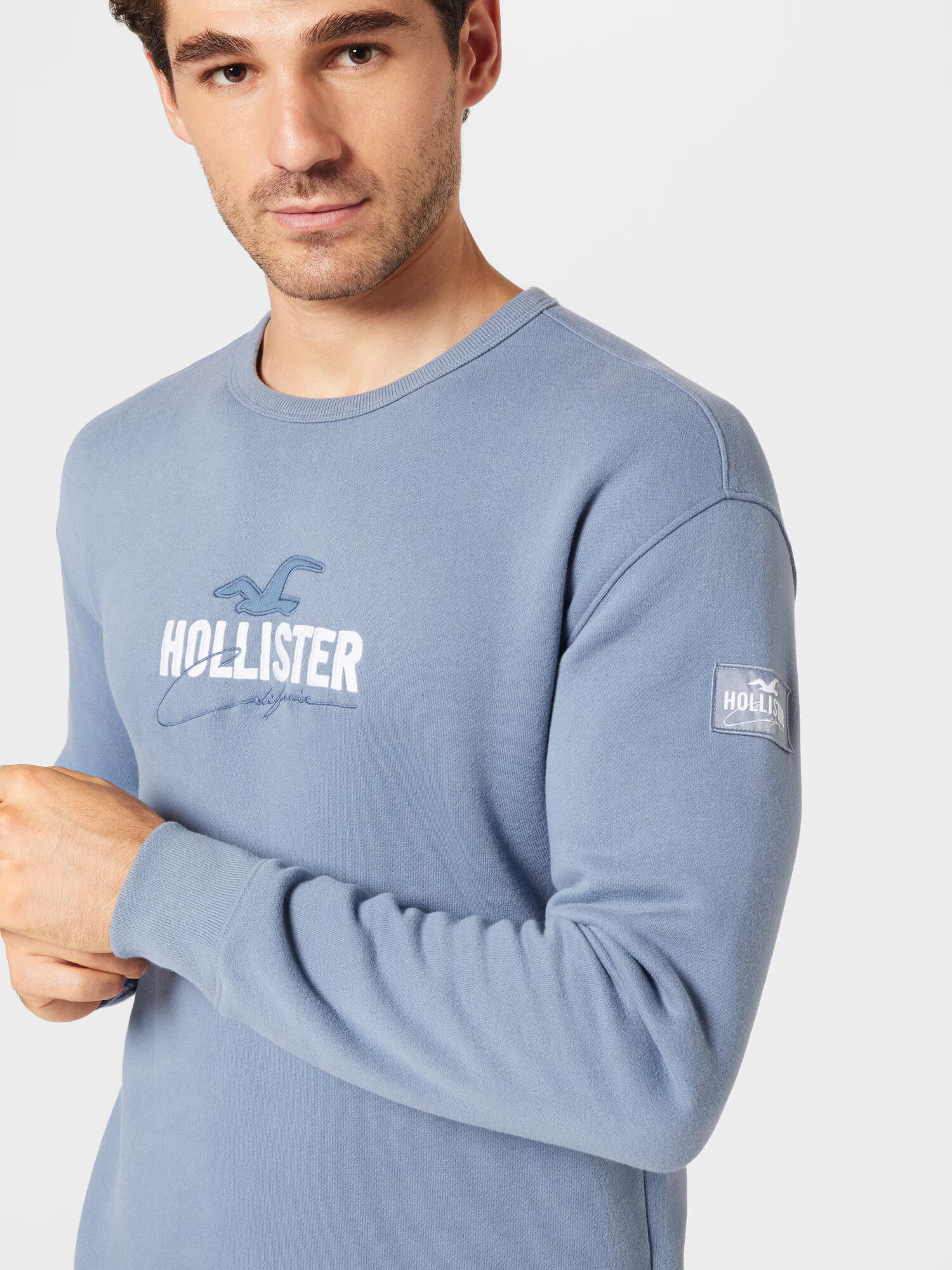 HOLLISTER Mikina 'EMEA' dymovo modrá / biela - Pepit.sk