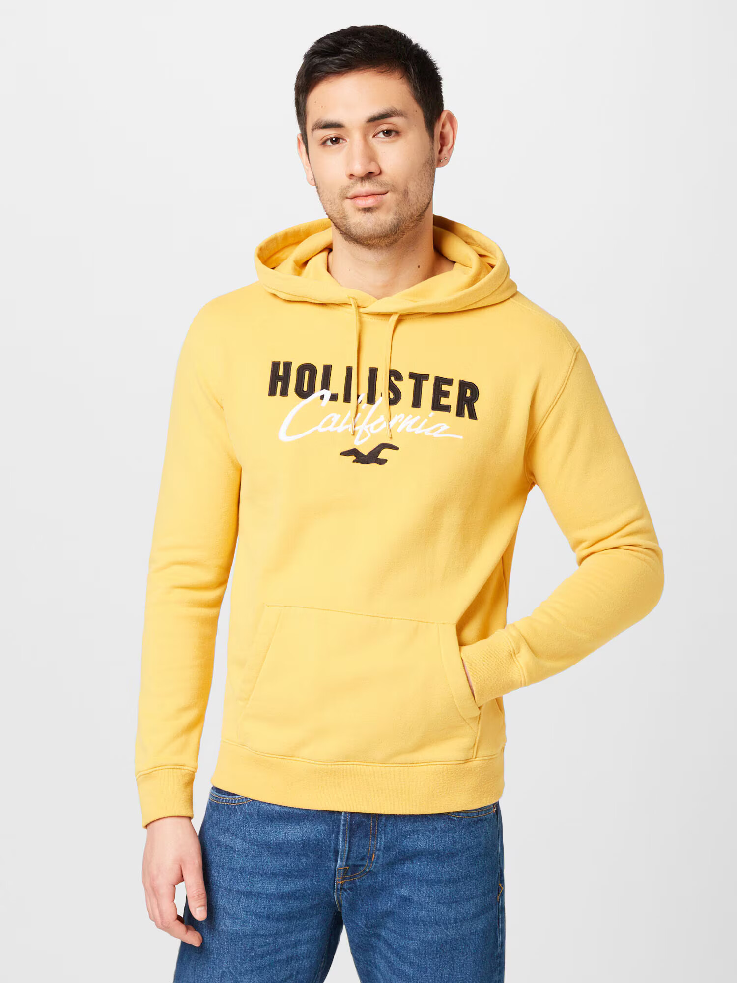 HOLLISTER Mikina zlatá žltá / čierna / biela - Pepit.sk