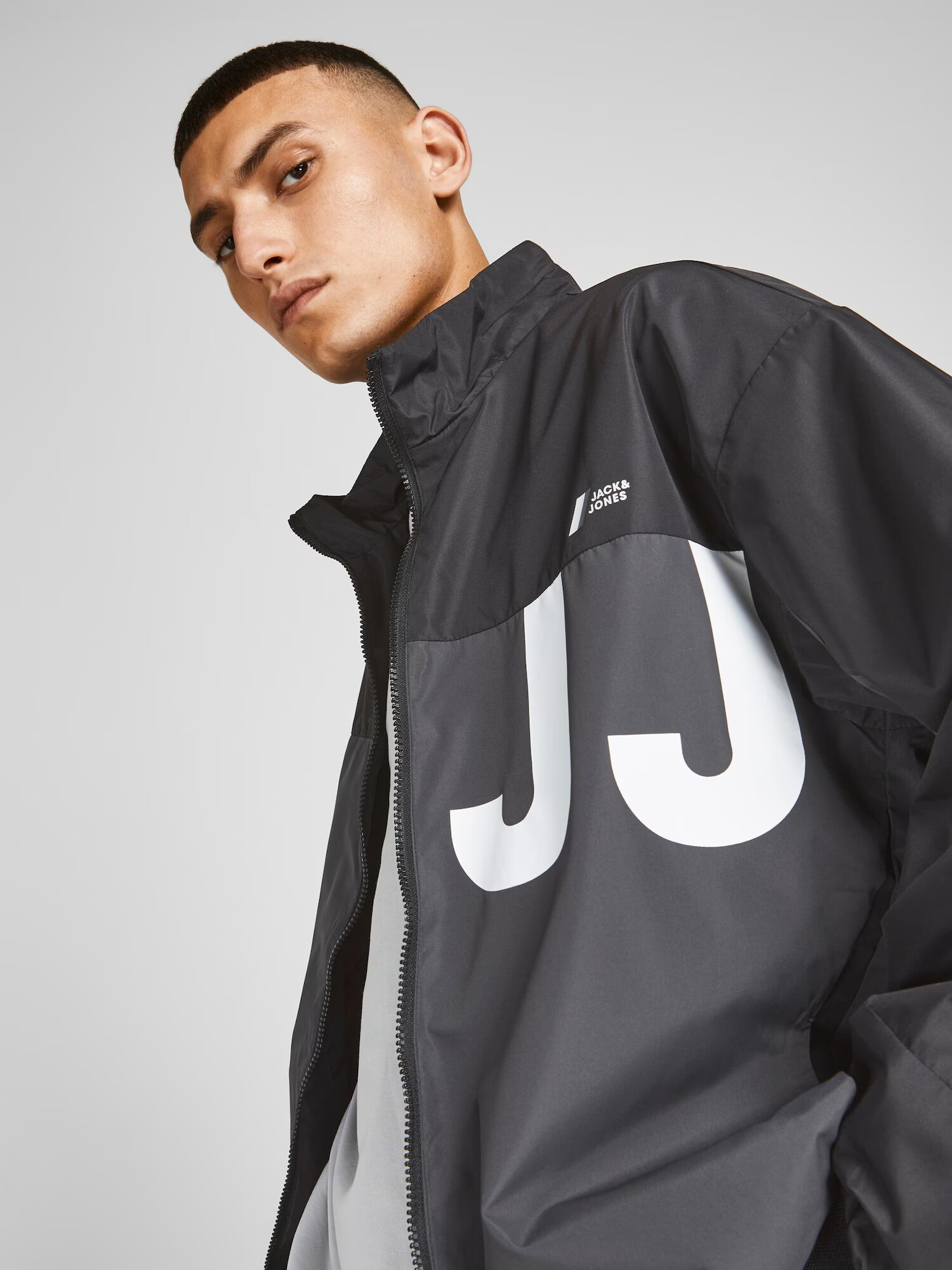 JACK & JONES Prechodná bunda 'Conrad' tmavosivá / čierna / biela - Pepit.sk