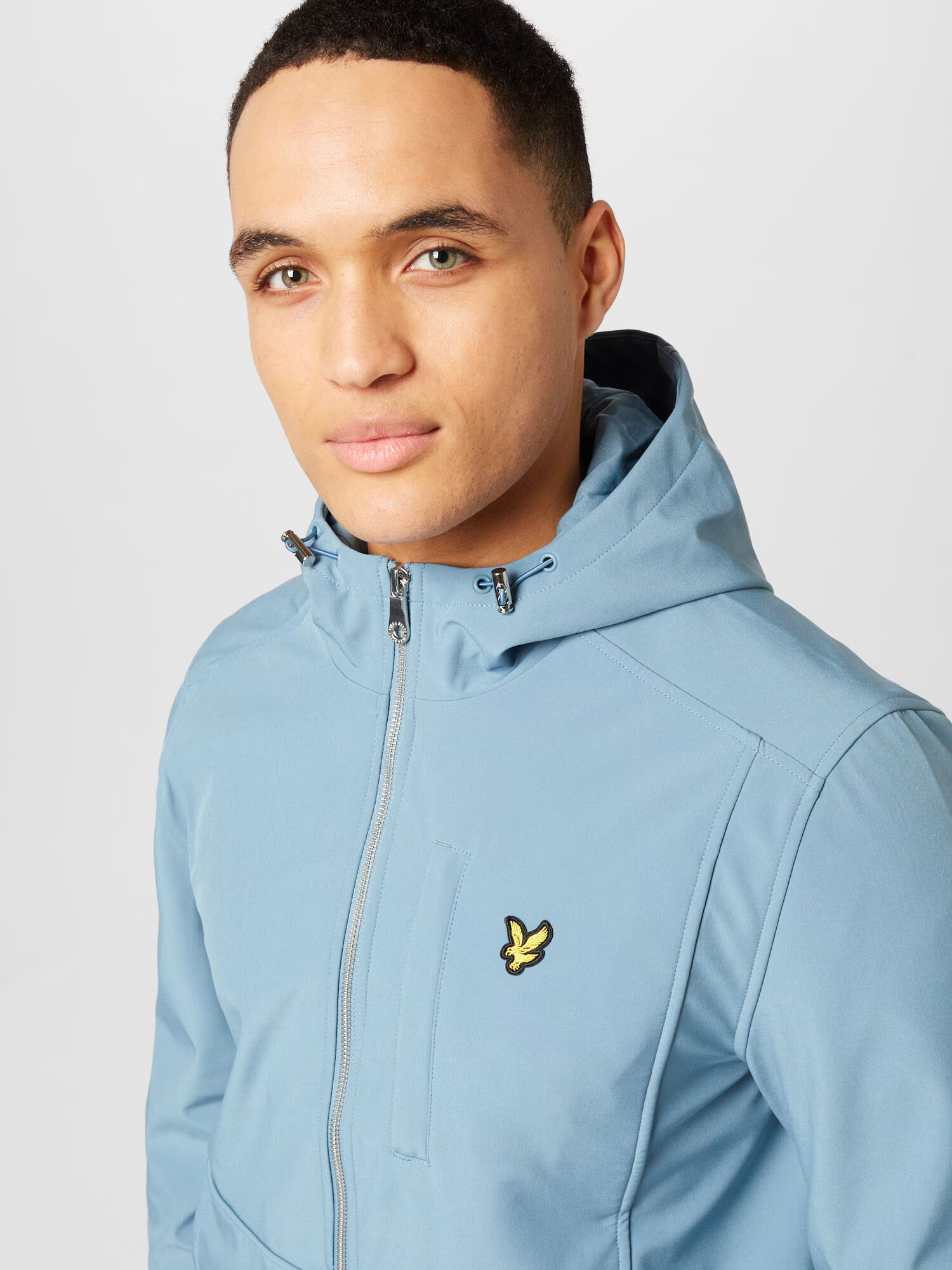 Lyle & Scott Prechodná bunda svetlomodrá / žltá / čierna - Pepit.sk