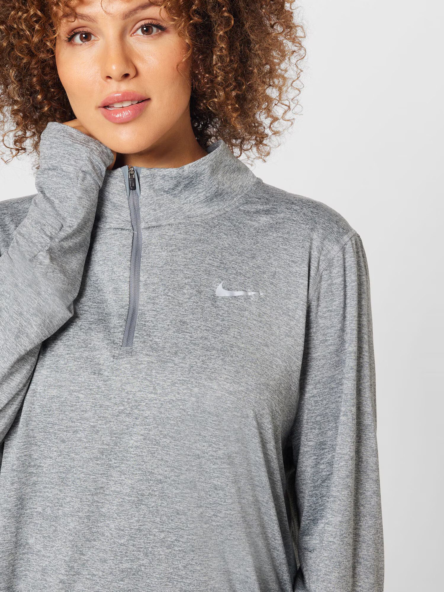 Nike Sportswear Funkčné tričko sivá melírovaná - Pepit.sk