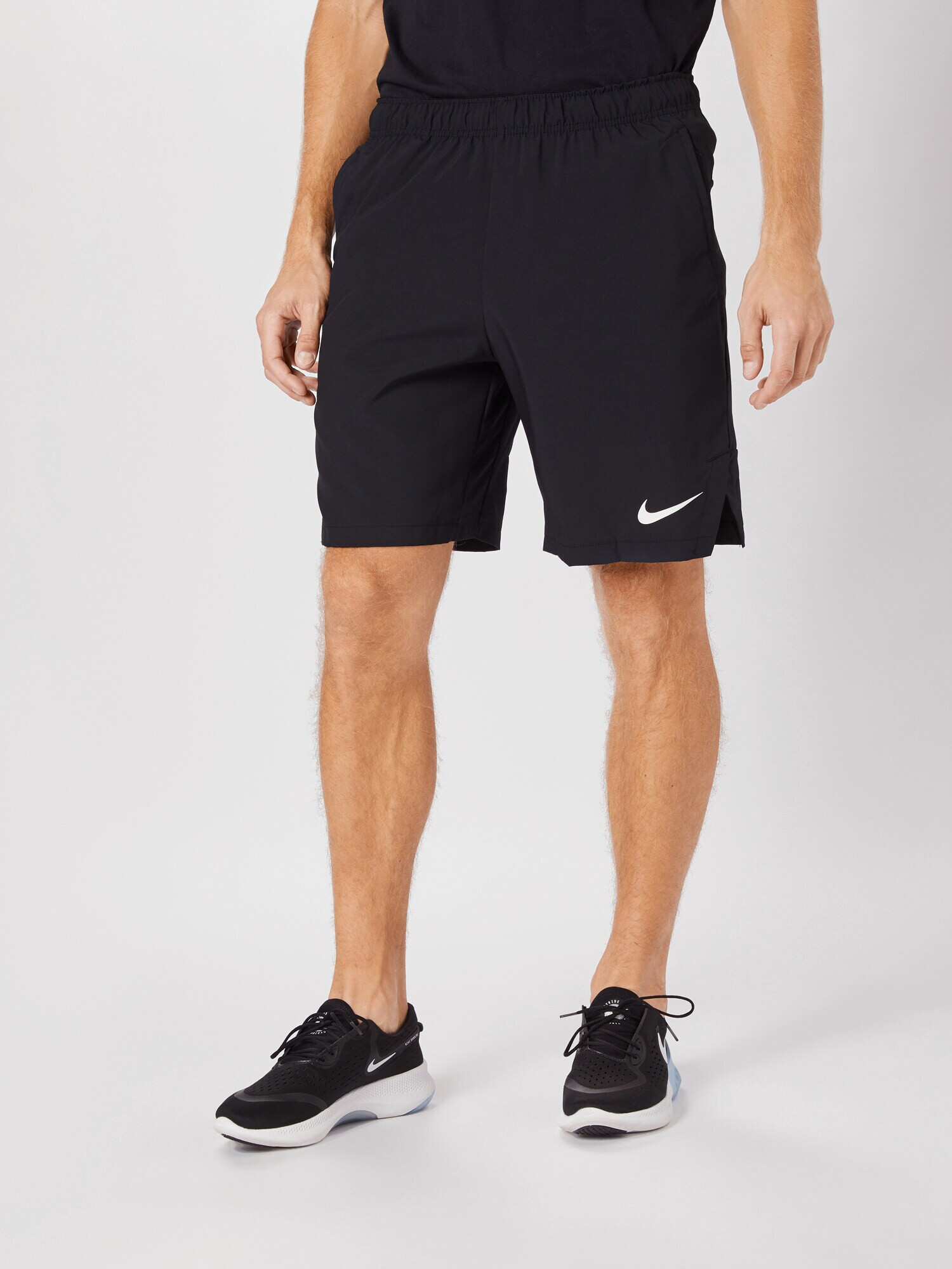 NIKE Športové nohavice 'FLEX' čierna / biela - Pepit.sk