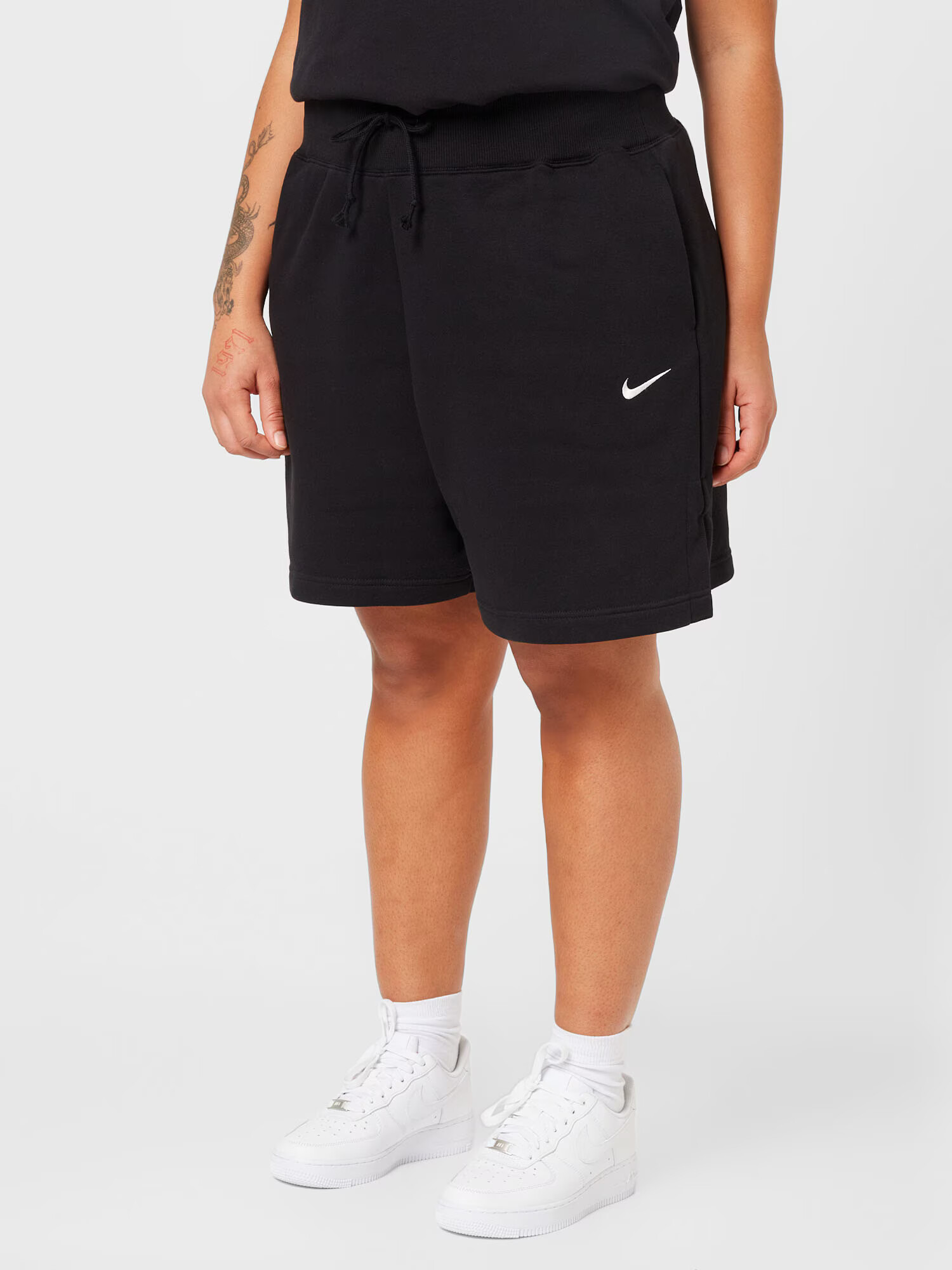 Nike Sportswear Športové nohavice čierna / biela - Pepit.sk