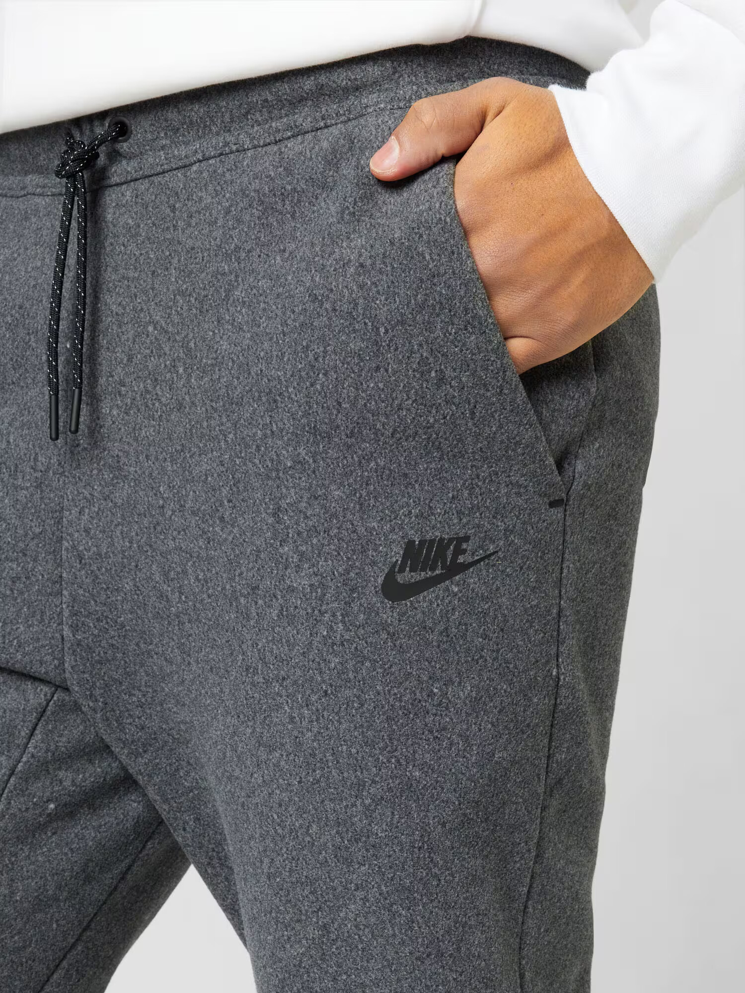 Nike Sportswear Nohavice čierna melírovaná - Pepit.sk