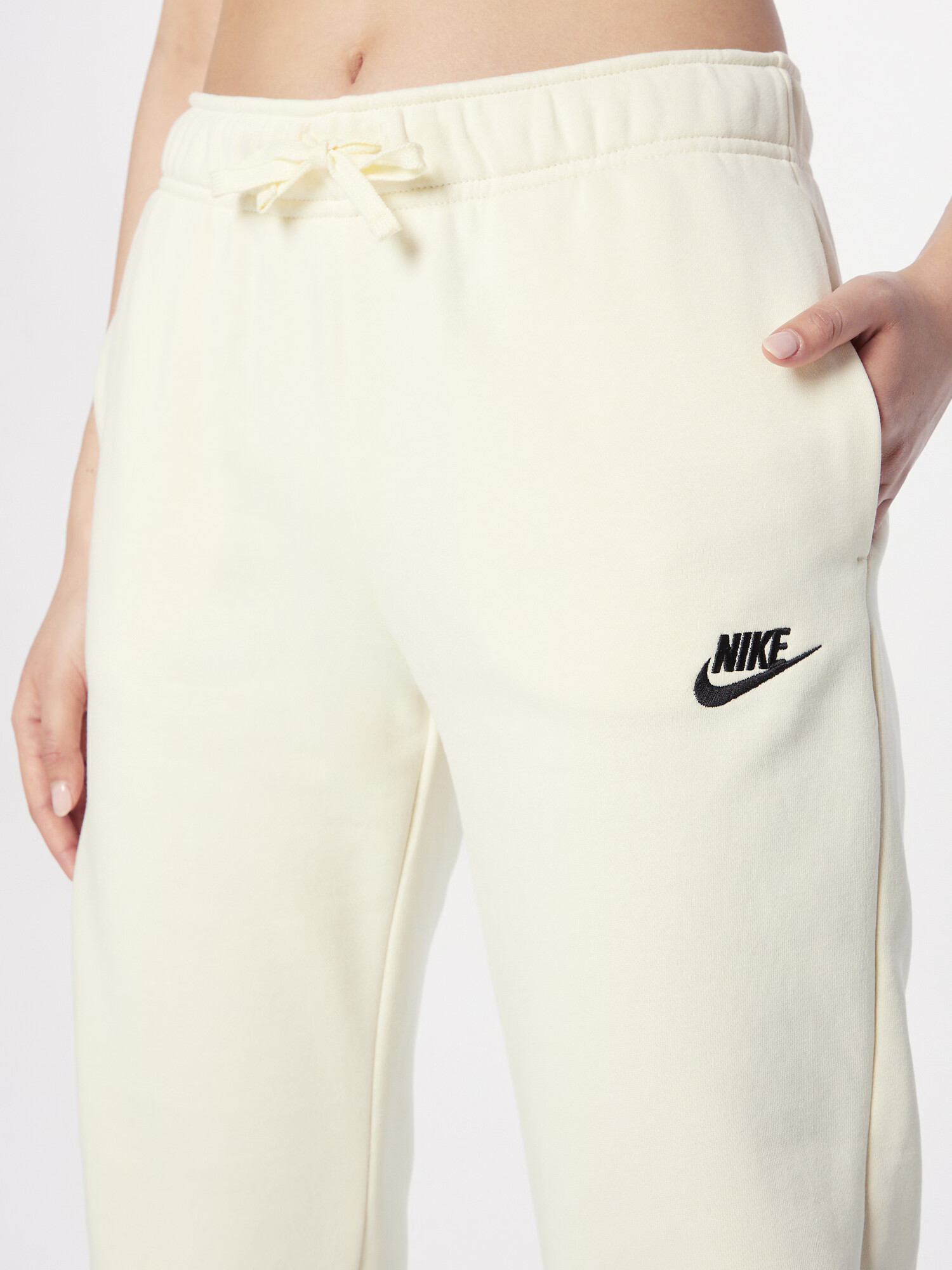 Nike Sportswear Nohavice krémová / čierna - Pepit.sk