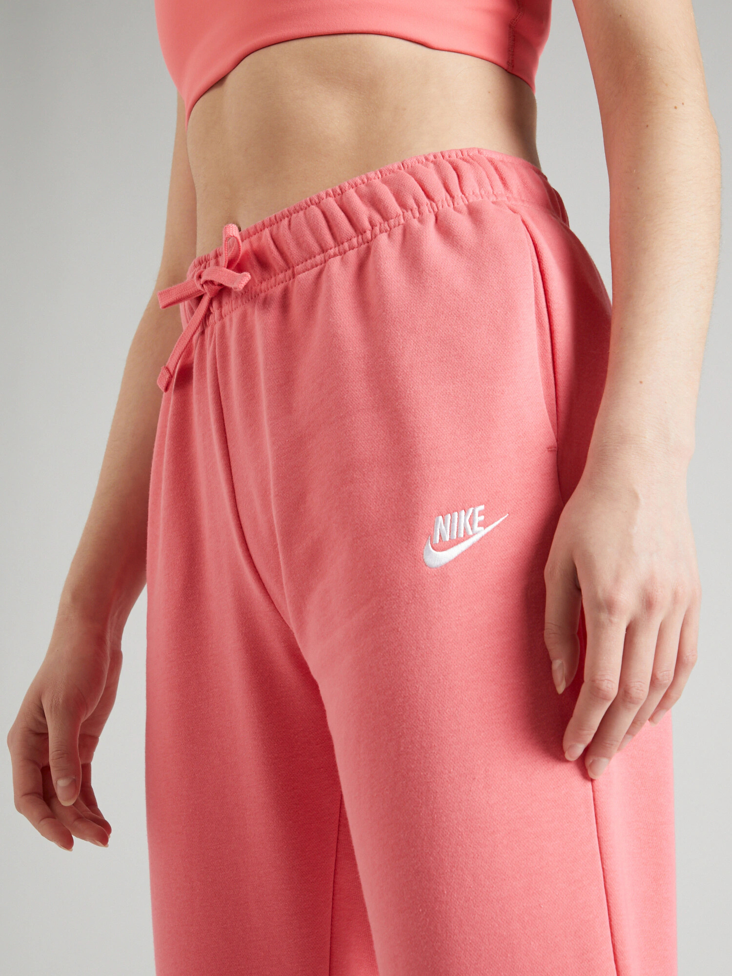 Nike Sportswear Nohavice lososová / biela - Pepit.sk