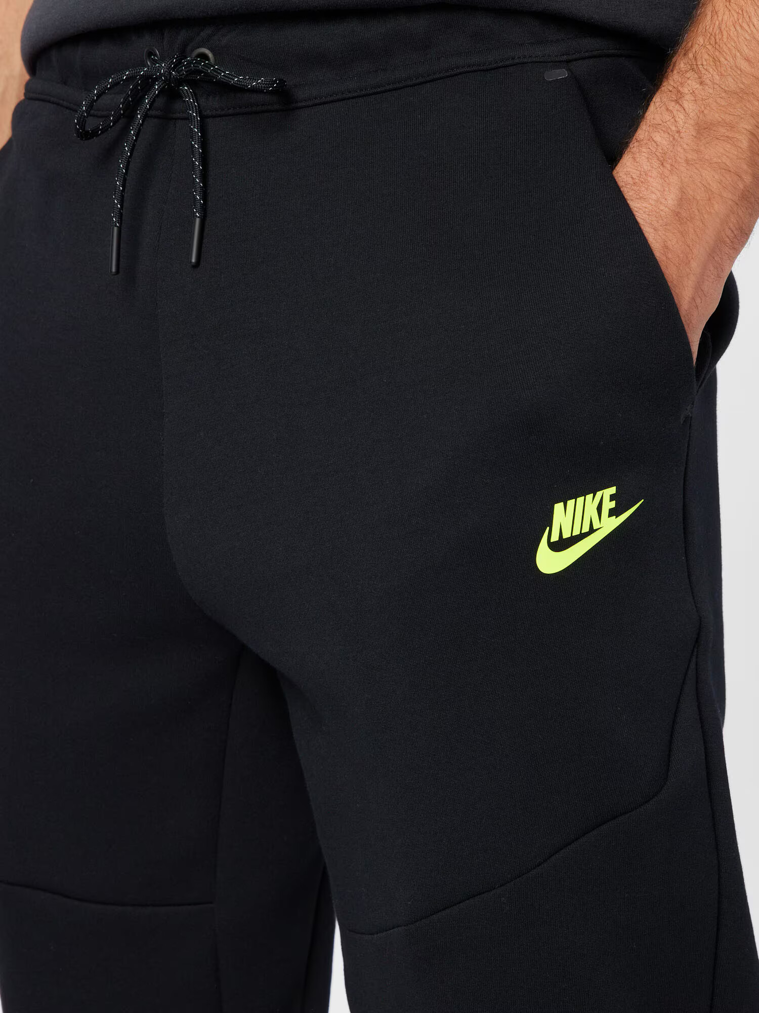 Nike Sportswear Športové nohavice neónovo žltá / čierna - Pepit.sk