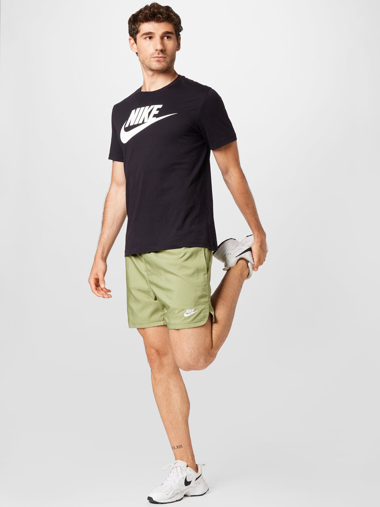 Nike Sportswear Nohavice olivová / biela - Pepit.sk