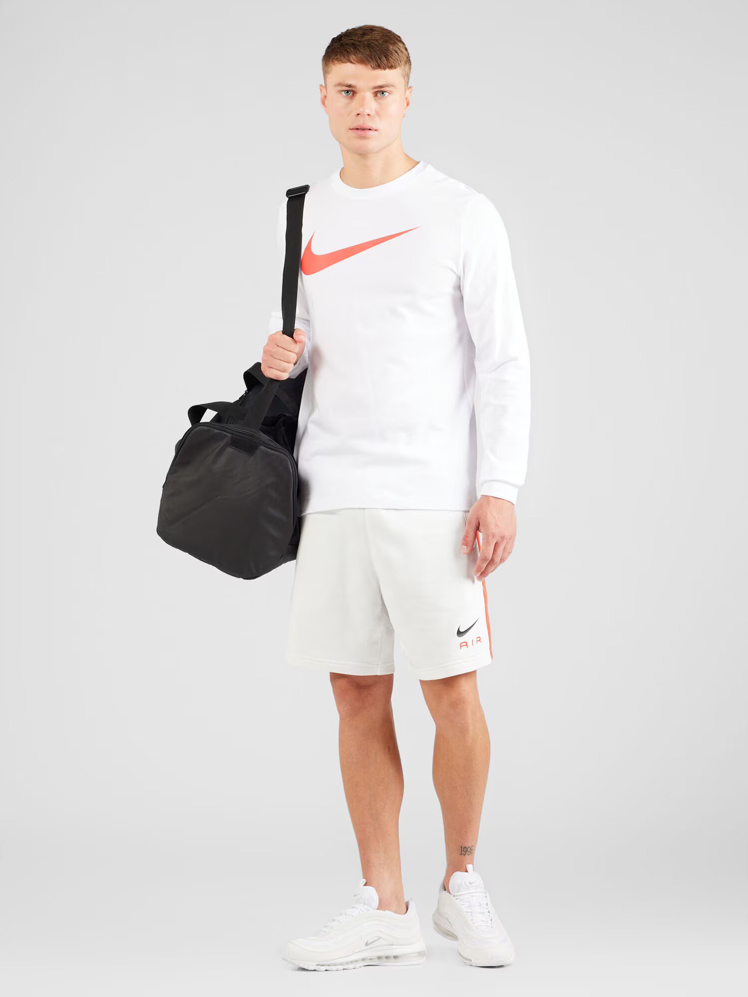 Nike Sportswear Nohavice oranžová / čierna / biela - Pepit.sk