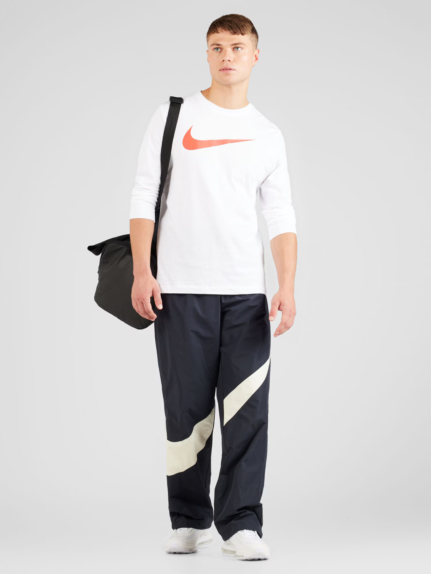 Nike Sportswear Nohavice tmelová / čierna - Pepit.sk