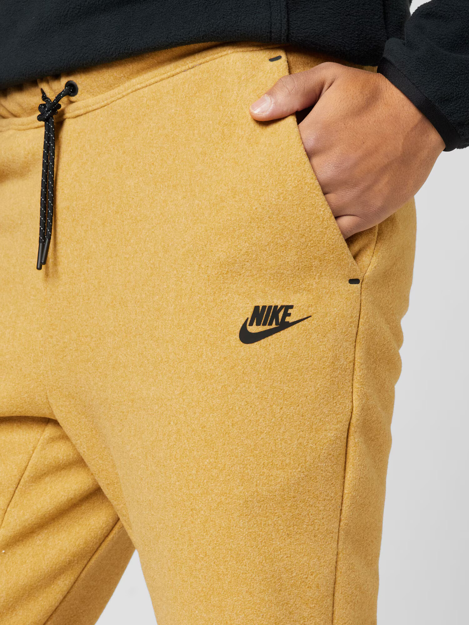 Nike Sportswear Nohavice zlatá žltá / čierna - Pepit.sk