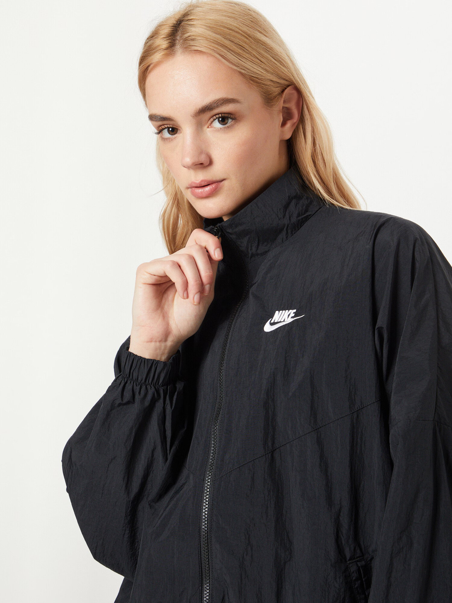 Nike Sportswear Prechodná bunda čierna / biela - Pepit.sk