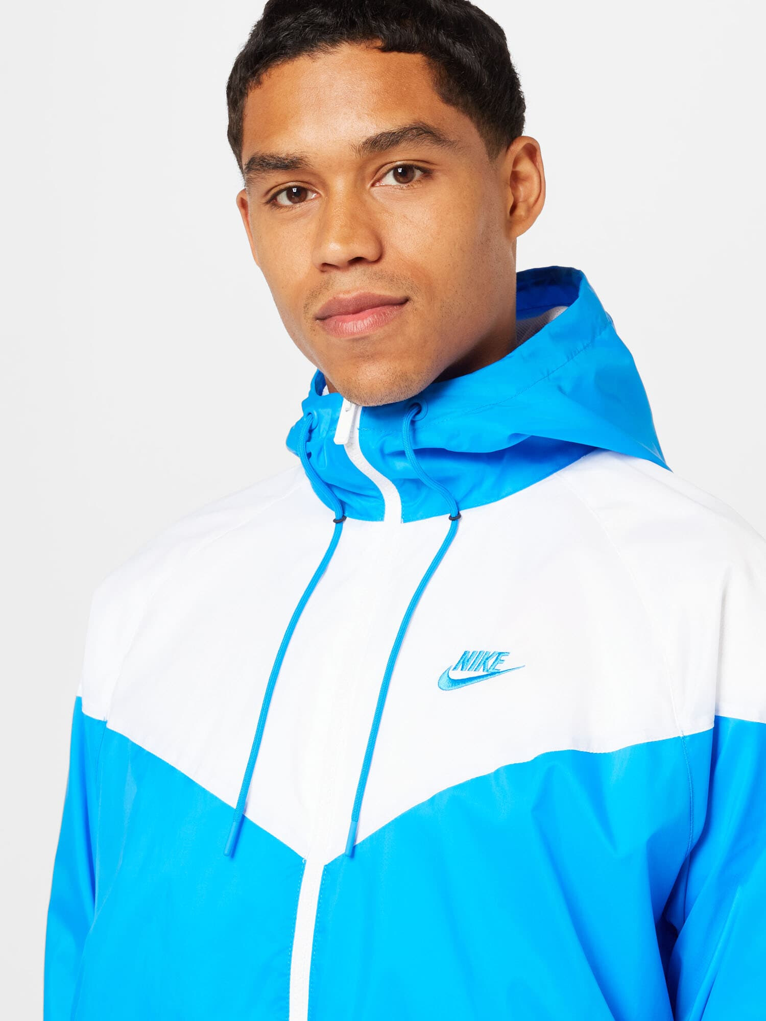 Nike Sportswear Prechodná bunda nebesky modrá / biela - Pepit.sk