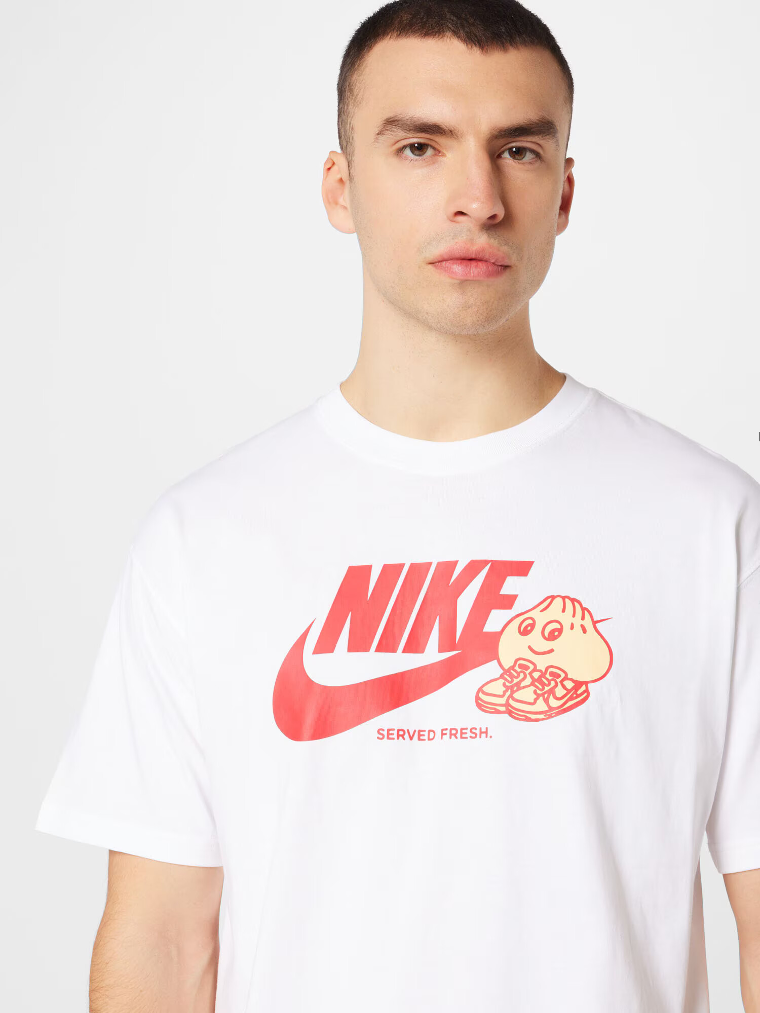 Nike Sportswear Tričko pastelovo oranžová / grenadínová / biela - Pepit.sk