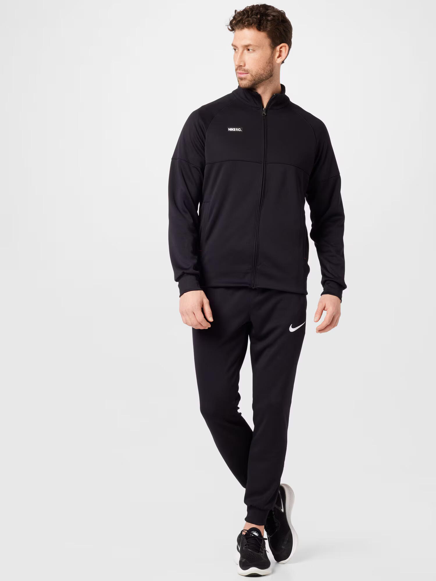 NIKE Tréningový komplet 'LIBERO' čierna / biela - Pepit.sk