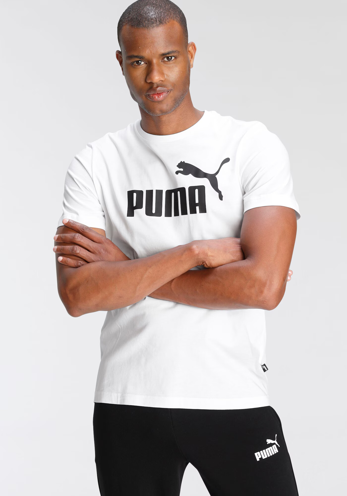 PUMA Funkčné tričko 'Essential' čierna / biela - Pepit.sk