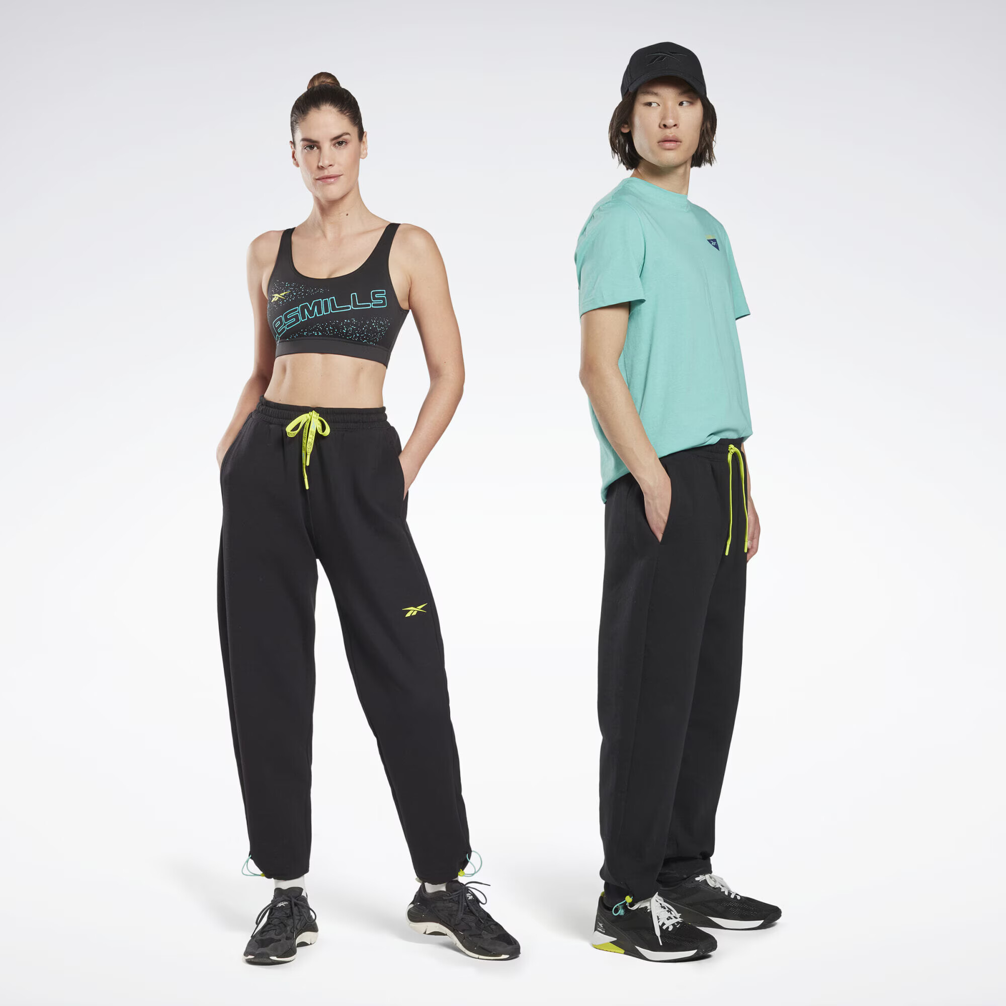 Reebok Sport Športové nohavice 'Les Mills®' žltá / čierna - Pepit.sk