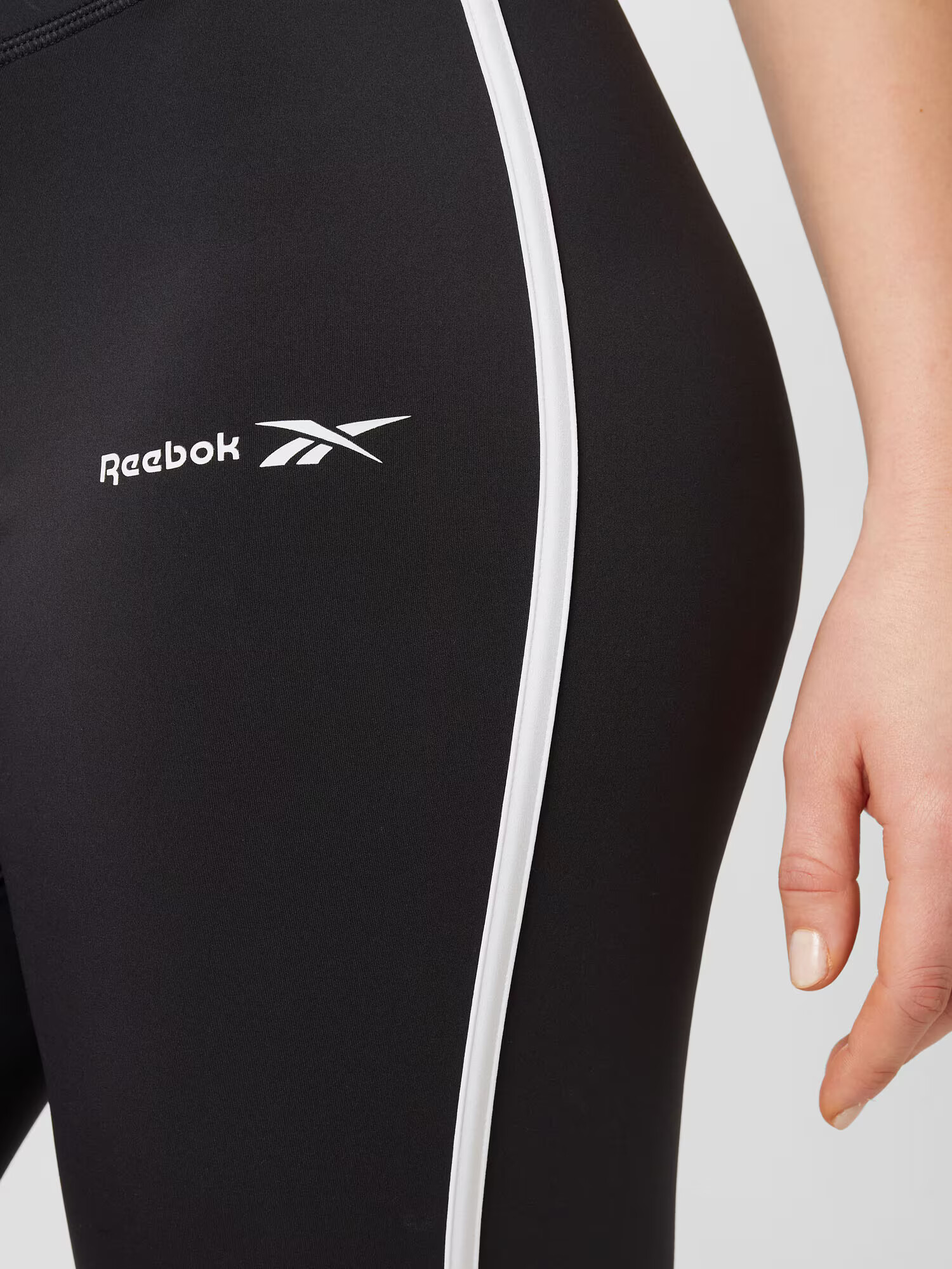 Reebok Sport Športové nohavice 'RIE' čierna / biela - Pepit.sk