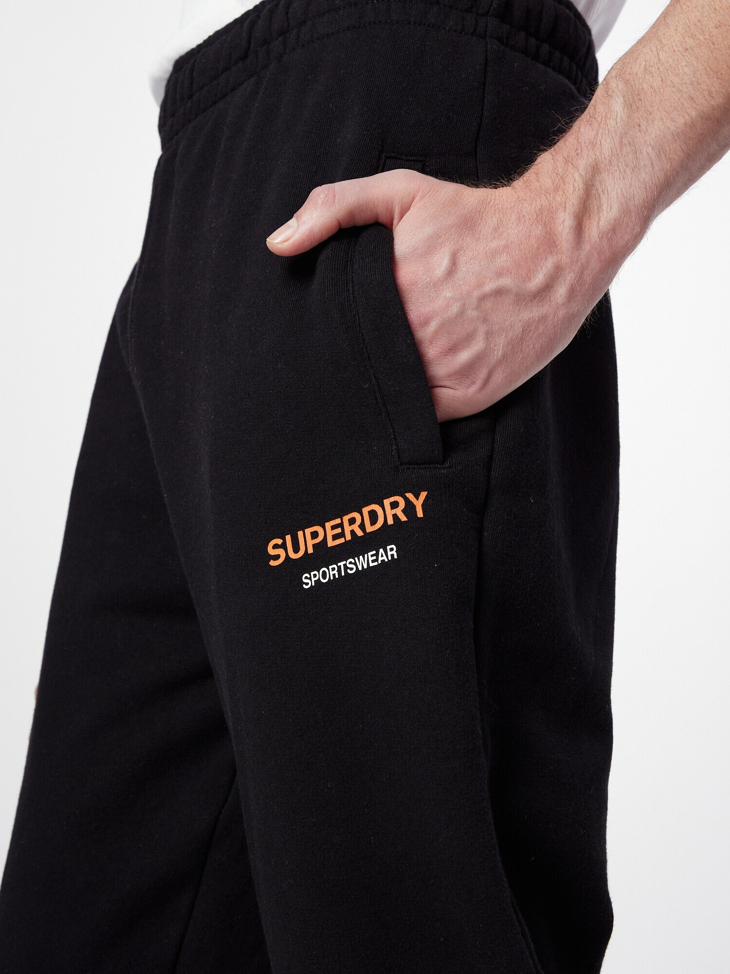 Superdry Nohavice oranžová / čierna / biela - Pepit.sk