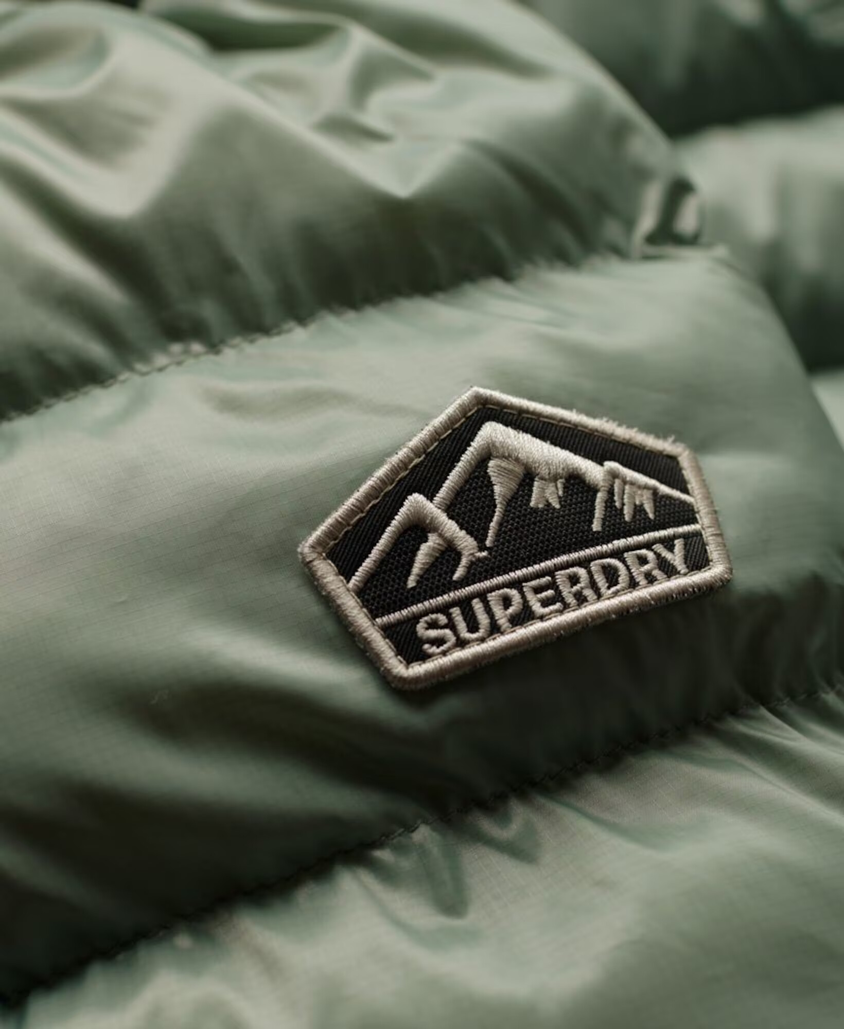 Superdry Prechodná bunda 'Fuji' zelená / čierna - Pepit.sk