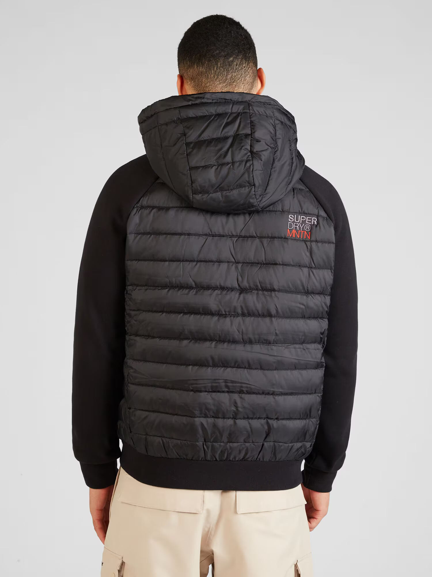 Superdry Prechodná bunda 'Storm Hybrid' sivá / červená / čierna - Pepit.sk