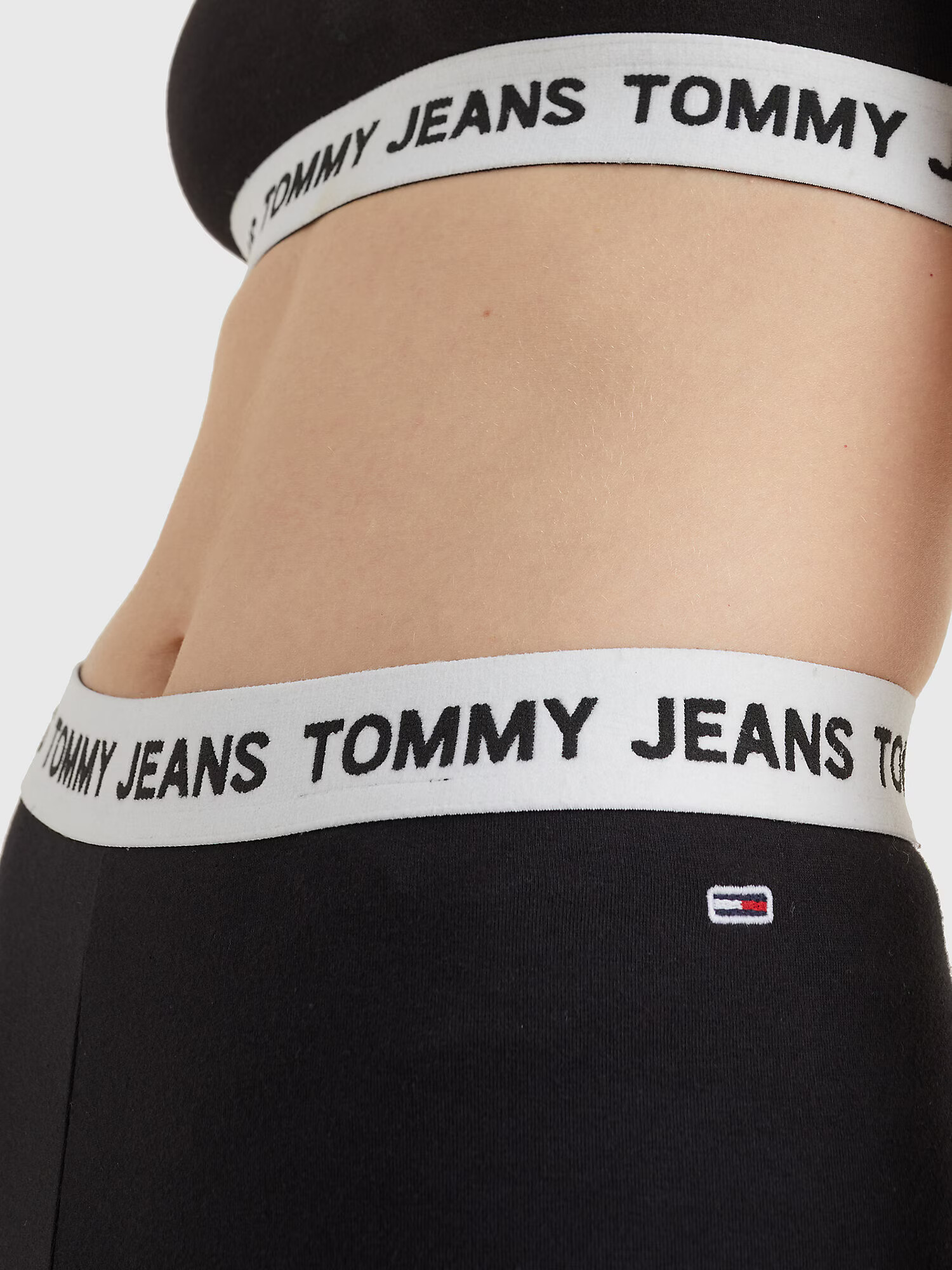 Tommy Jeans Nohavice čierna / biela - Pepit.sk