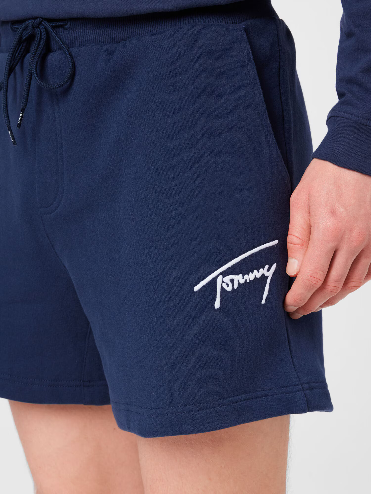 Tommy Jeans Nohavice námornícka modrá / biela - Pepit.sk