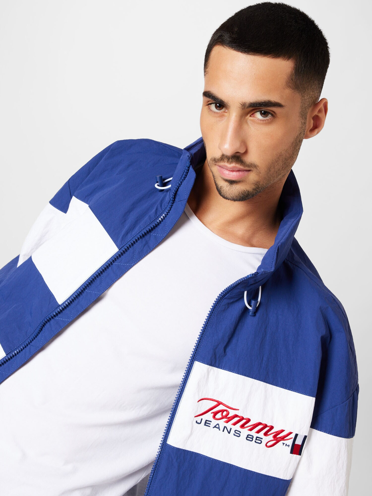 Tommy Jeans Prechodná bunda modrá / jasne červená / biela - Pepit.sk