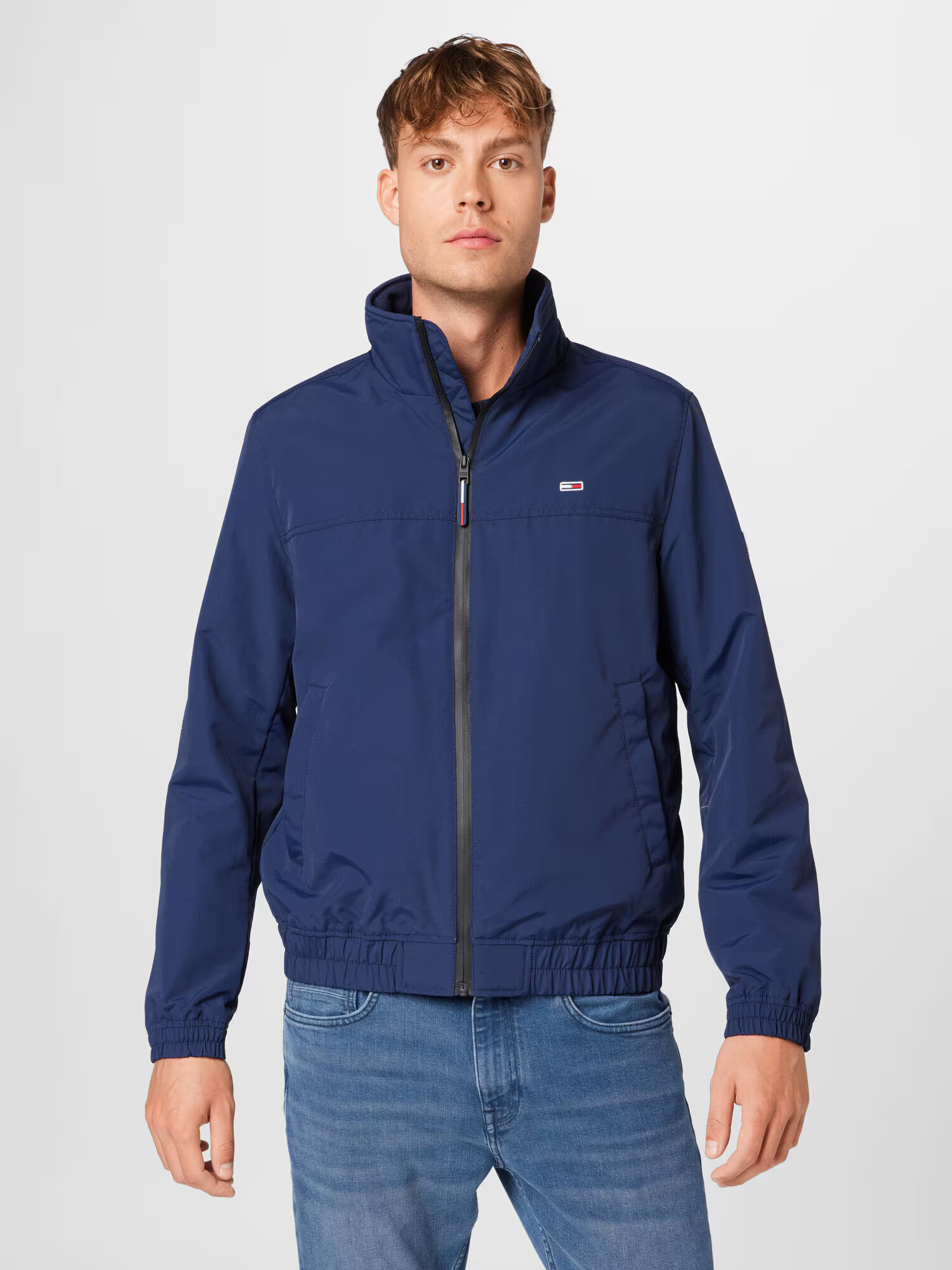 Tommy Jeans Prechodná bunda námornícka modrá / červená / biela - Pepit.sk