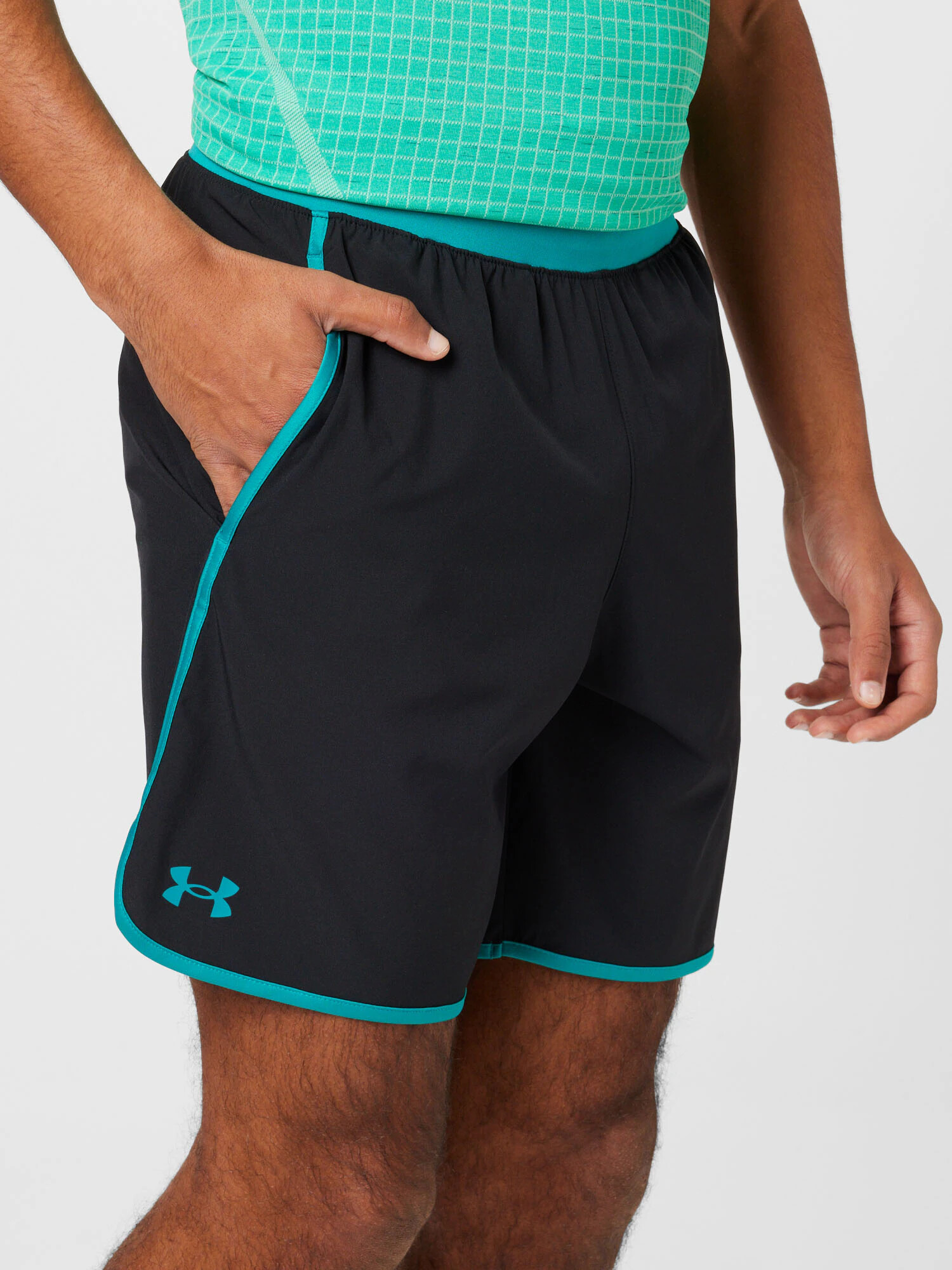 UNDER ARMOUR Športové nohavice 'HIIT' nefritová / čierna - Pepit.sk