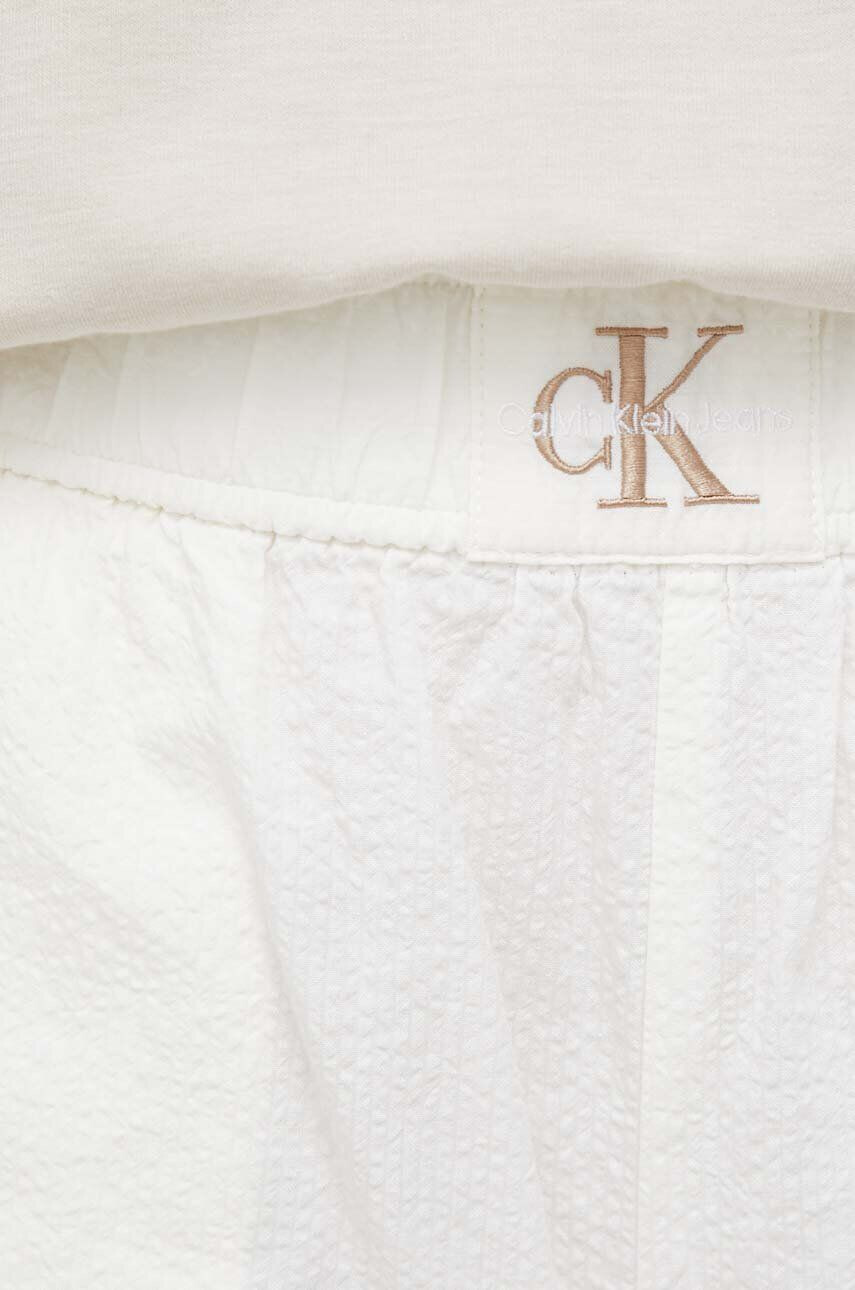 Calvin Klein Jeans Bavlnené šortky béžová farba s potlačou vysoký pás - Pepit.sk