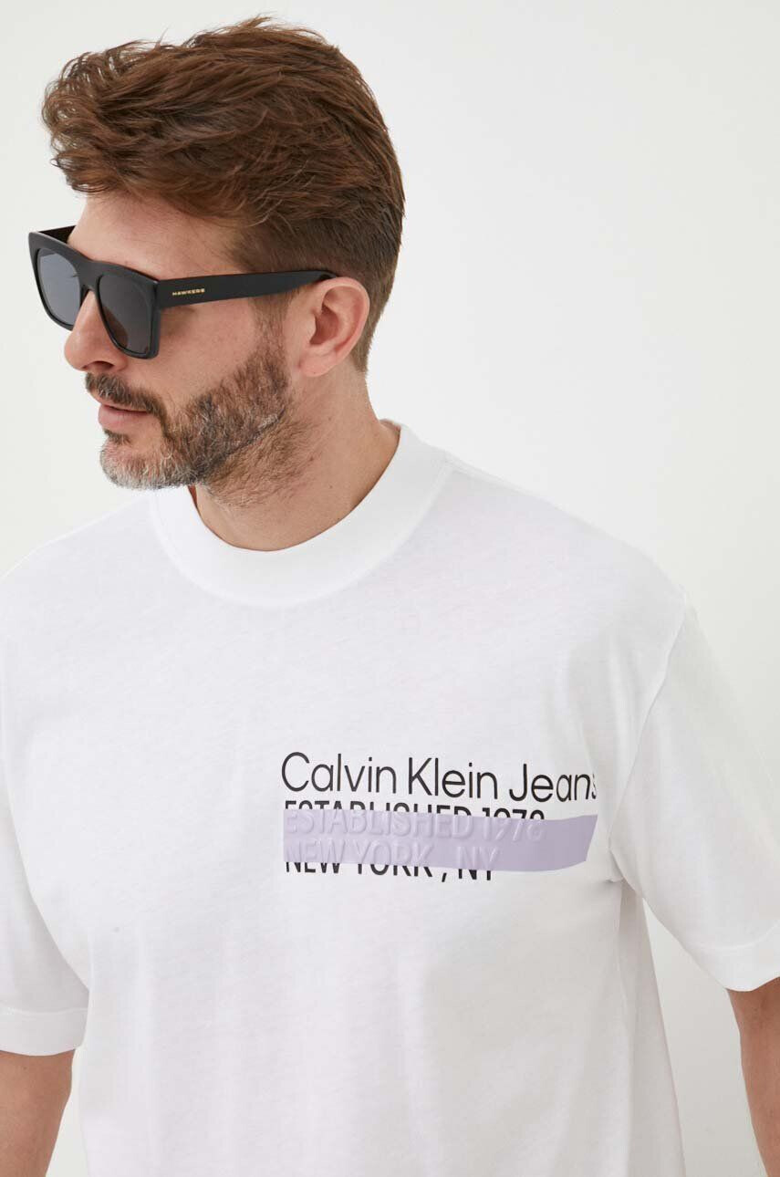 Calvin Klein Jeans Bavlnené tričko oranžová farba - Pepit.sk