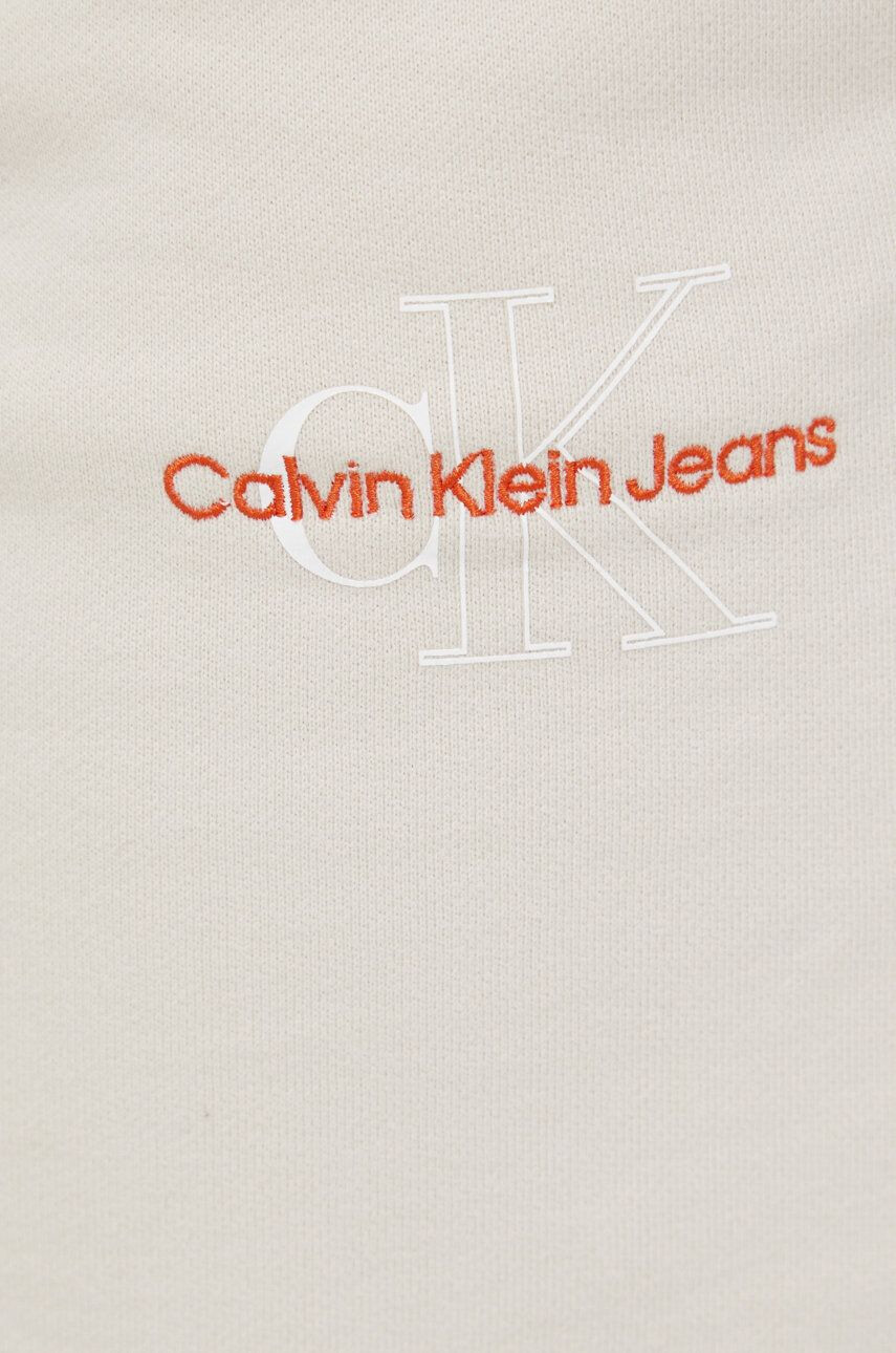 Calvin Klein Jeans Bavlnená sukňa béžová farba mini rovný strih - Pepit.sk