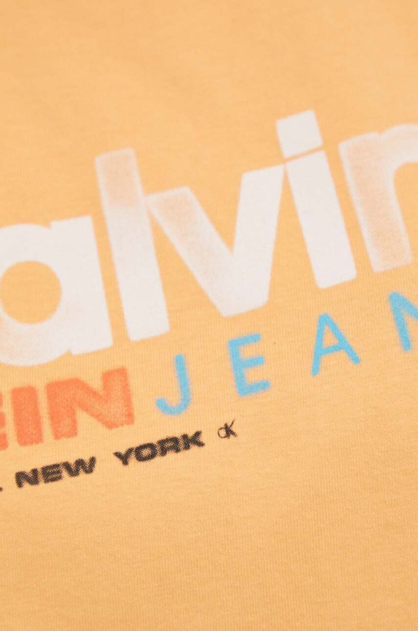 Calvin Klein Jeans Bavlnený top oranžová farba - Pepit.sk