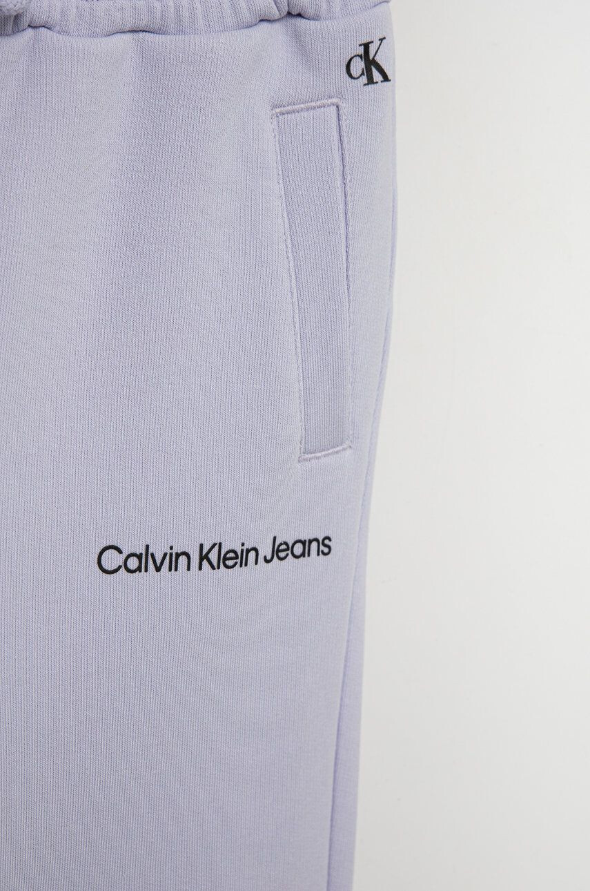 Calvin Klein Jeans Detské tepláky fialová farba jednofarebné - Pepit.sk