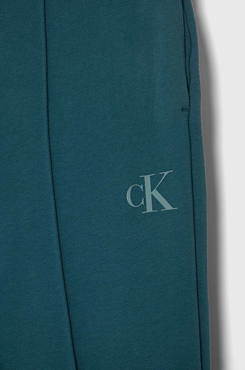 Calvin Klein Jeans Detské tepláky tyrkysová farba jednofarebné - Pepit.sk