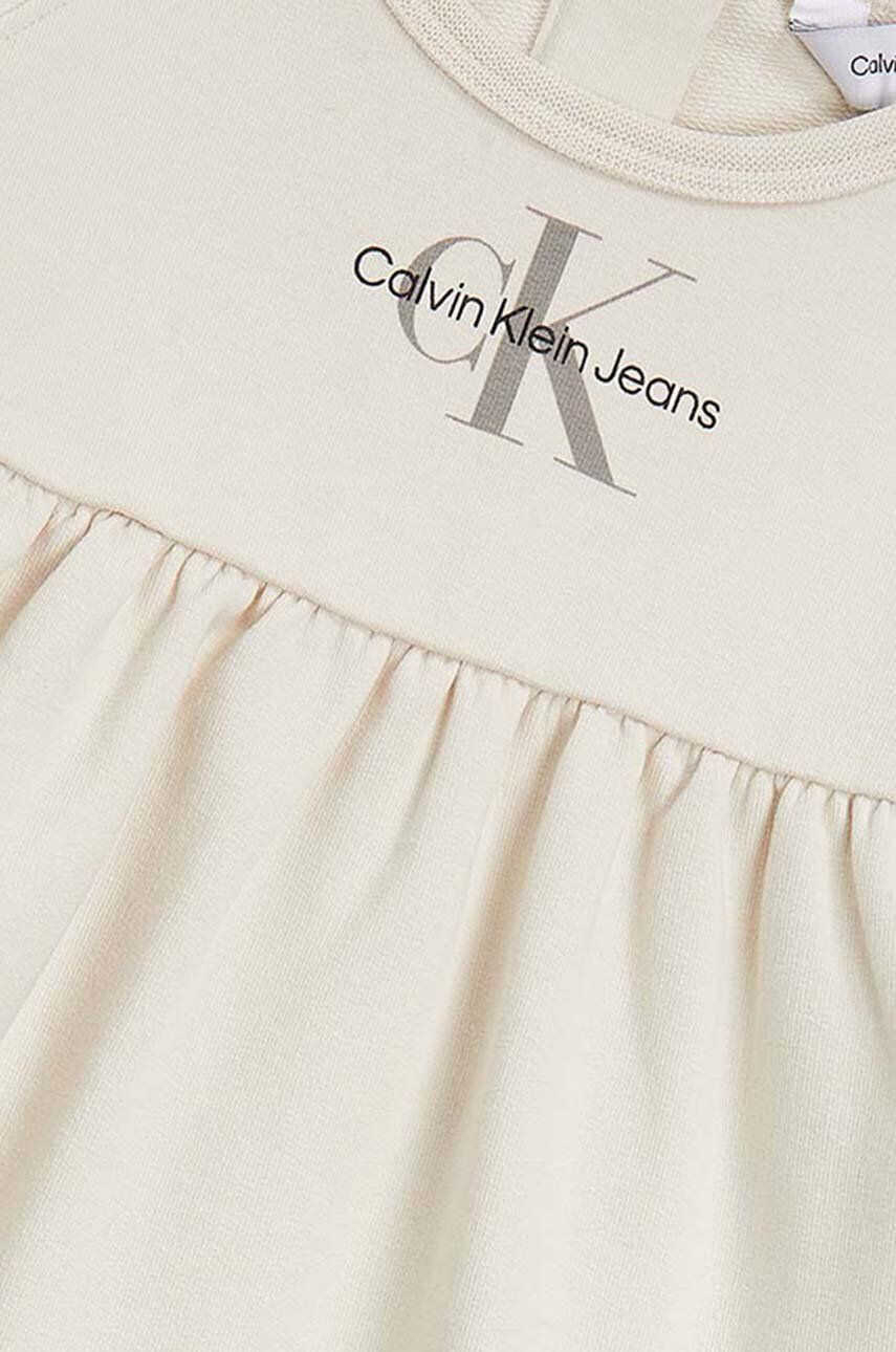 Calvin Klein Jeans Dievčenské šaty béžová farba mini áčkový strih - Pepit.sk